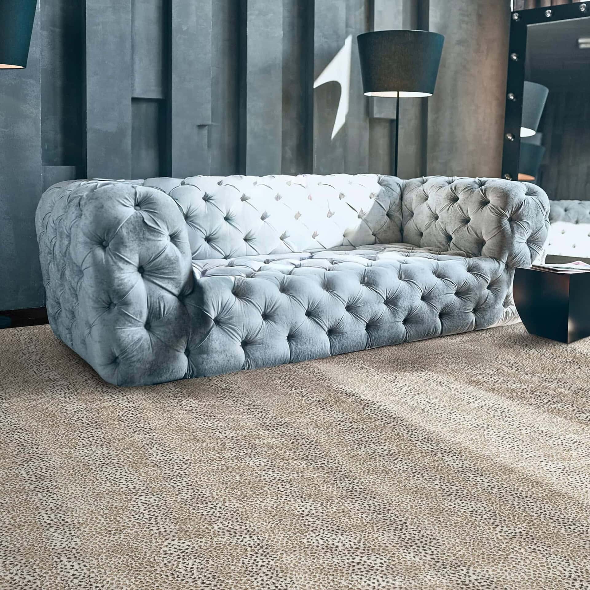 Luxurious tufted velvet sofa in modern living room decor.