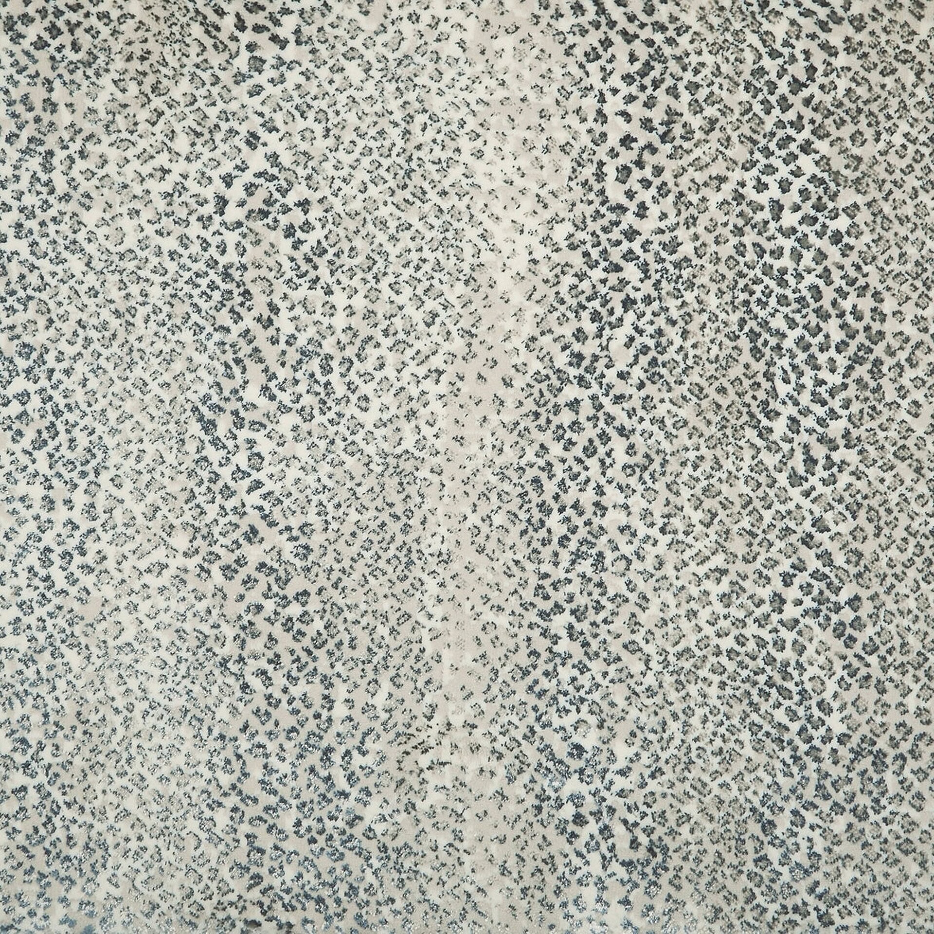 Luxurious patterned fabric with a black and white abstract animal print design.