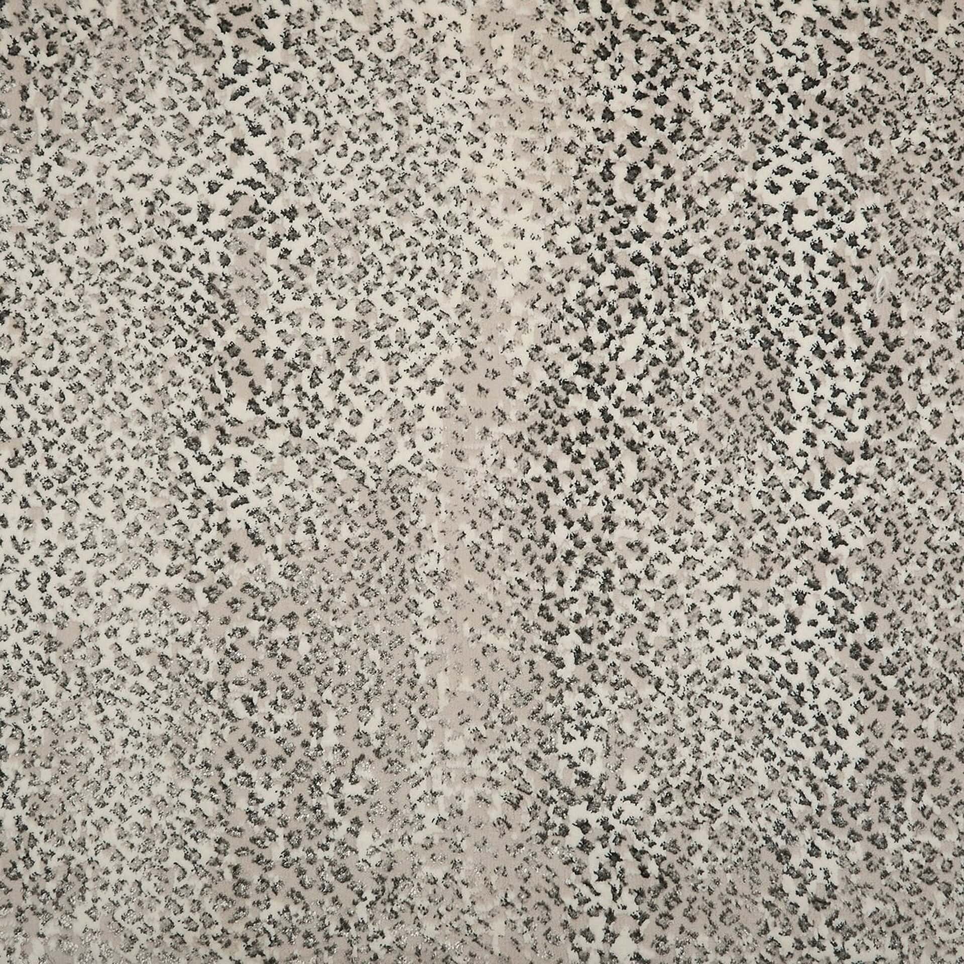 Luxurious textured fabric with black and white pattern for elegant furniture upholstery.