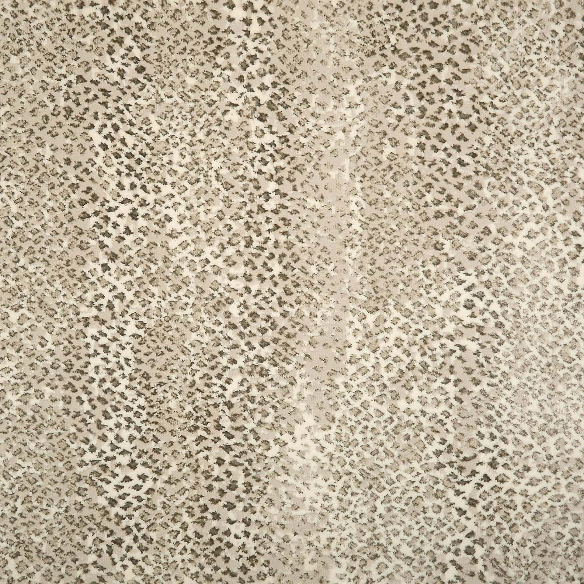 Luxurious animal print fabric in beige and black, ideal for custom furniture and upholstery.