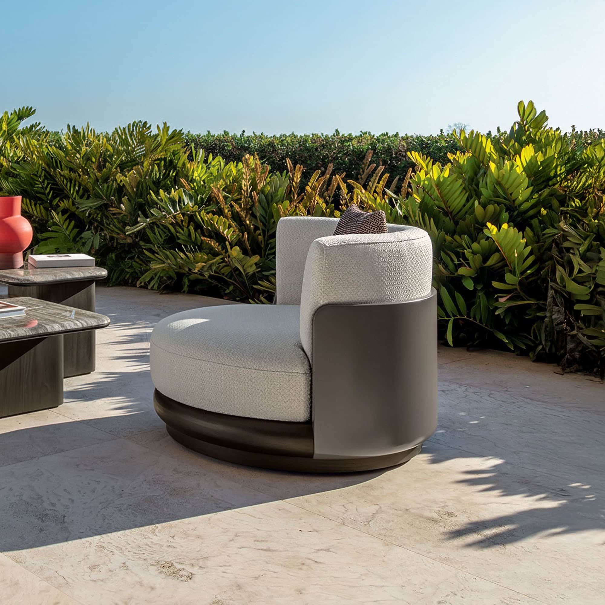 Contemporary outdoor lounge chair with modern design by Sklar Furnishings, ideal for stylish patio setups.