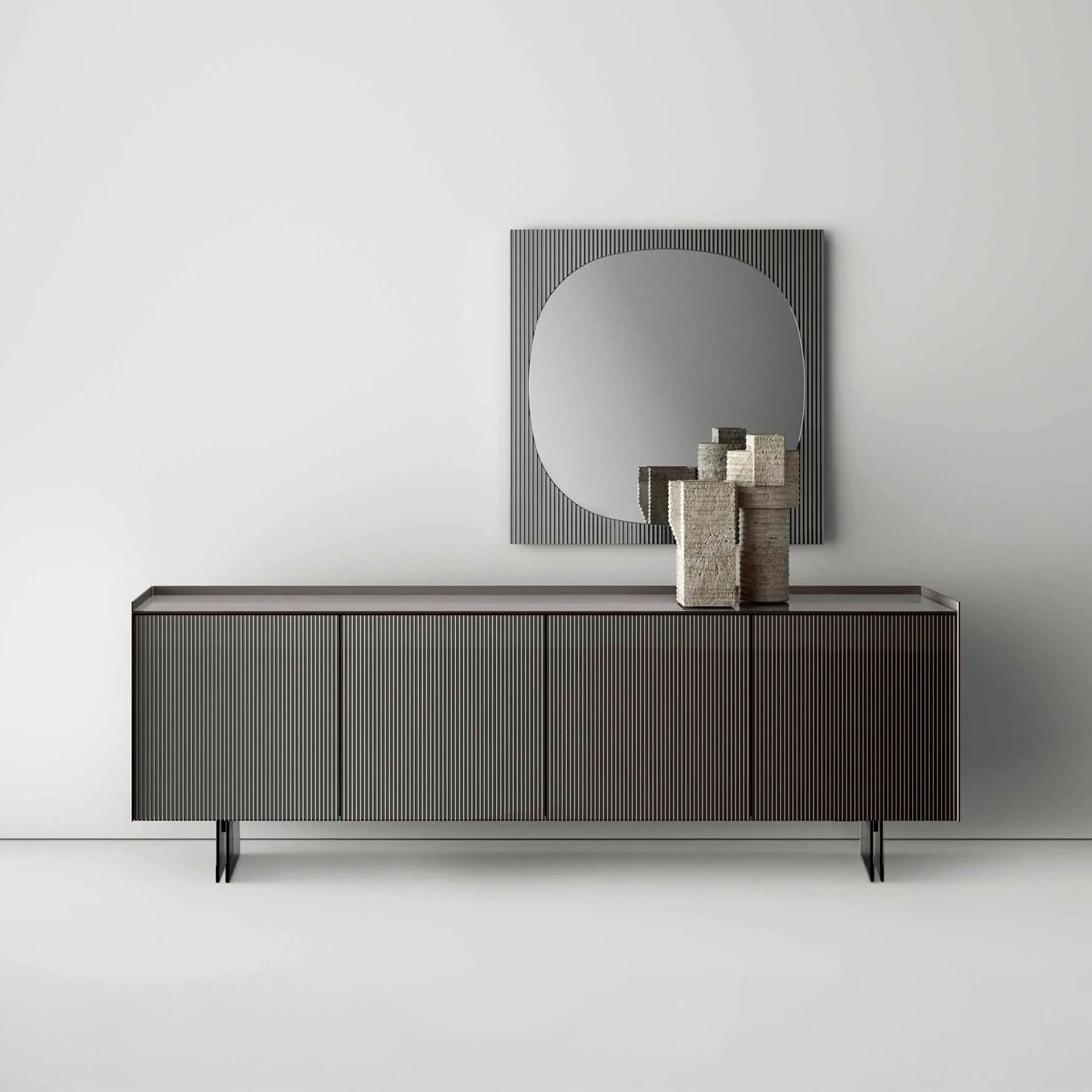 Modern black slat-wood sideboard with mirror and decorative sculptures.