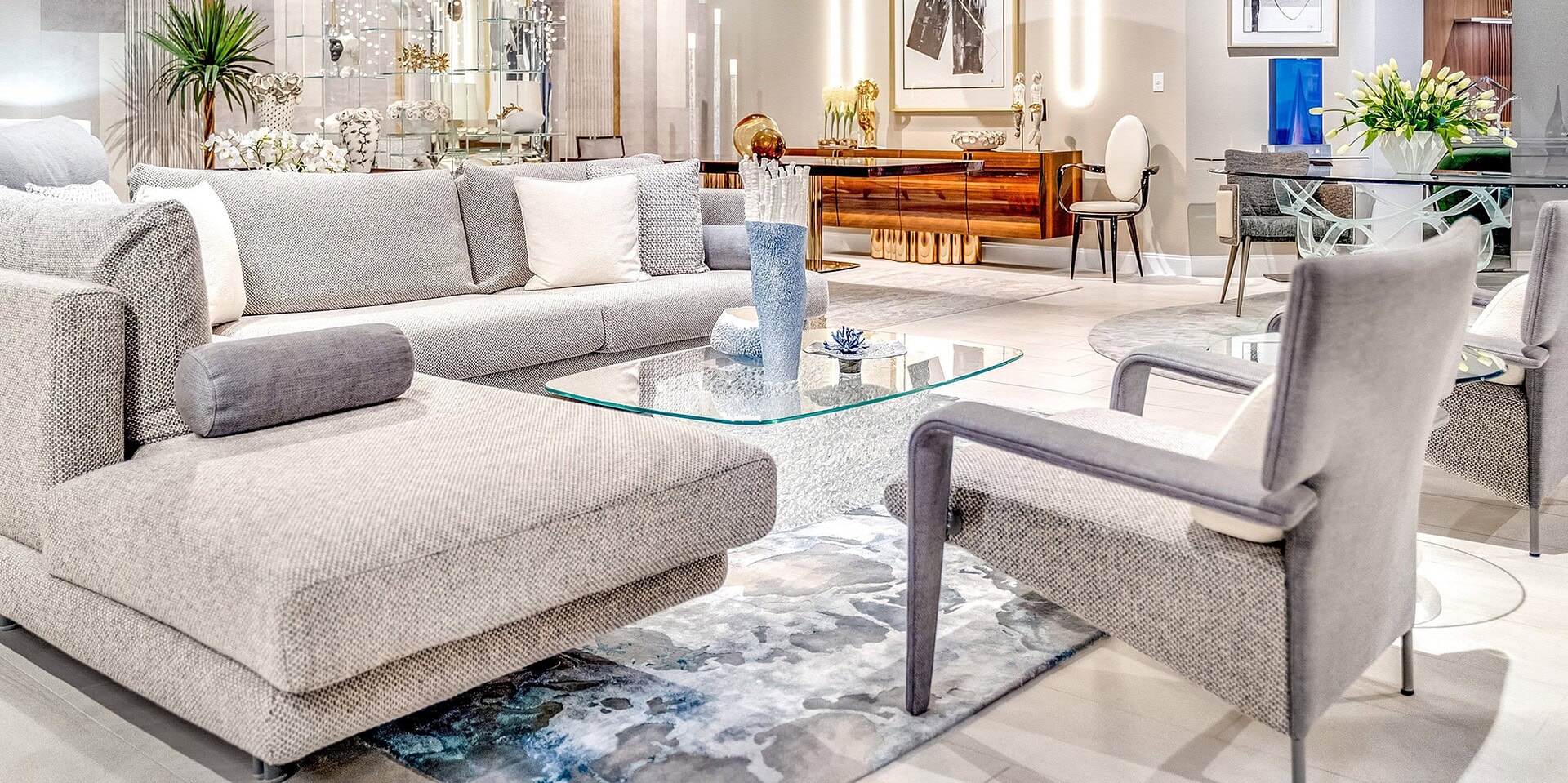 Modern contemporary living room furniture with stylish seating and glass coffee table.