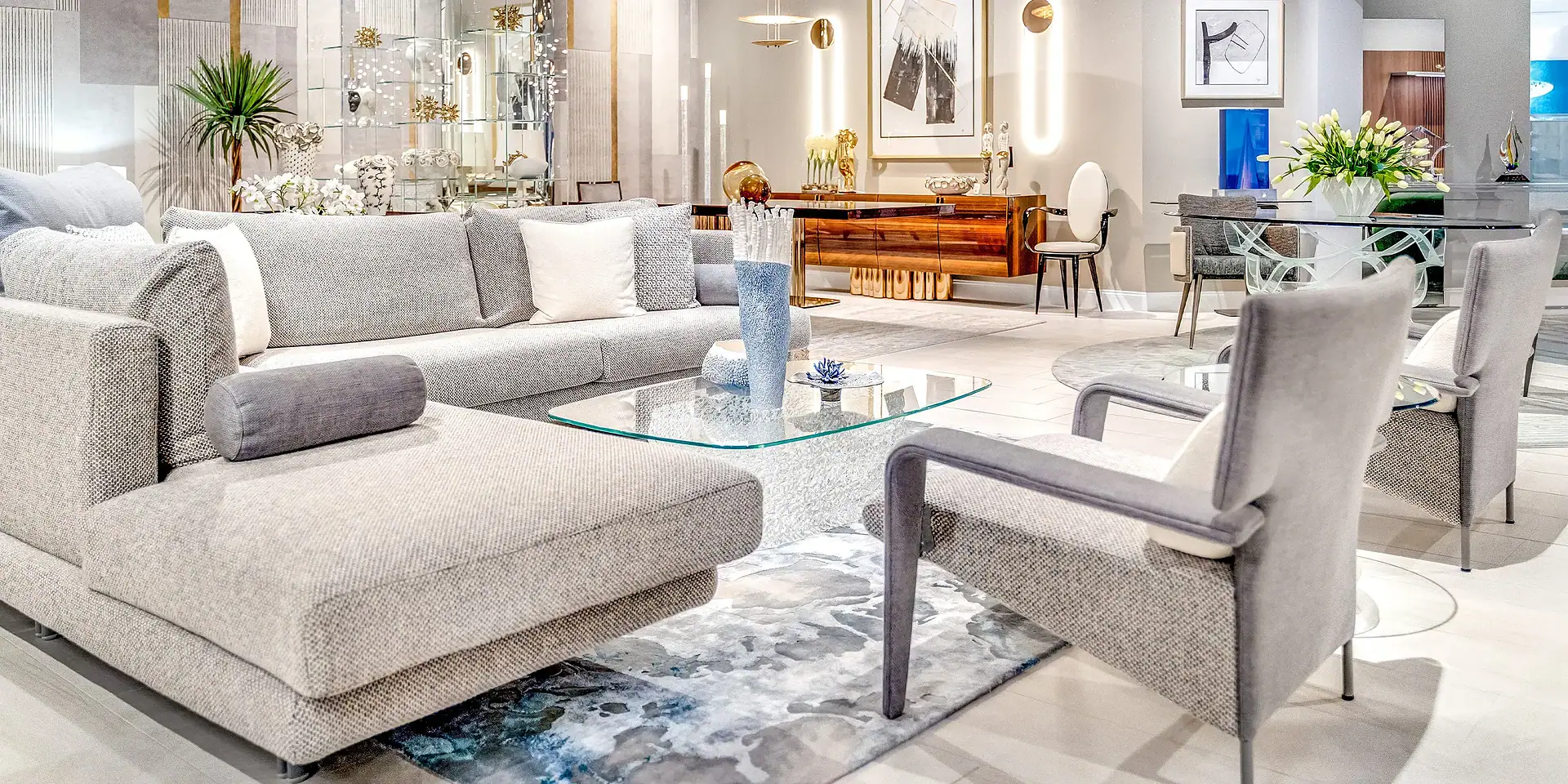 Modern contemporary living room furniture with stylish seating and glass coffee table.