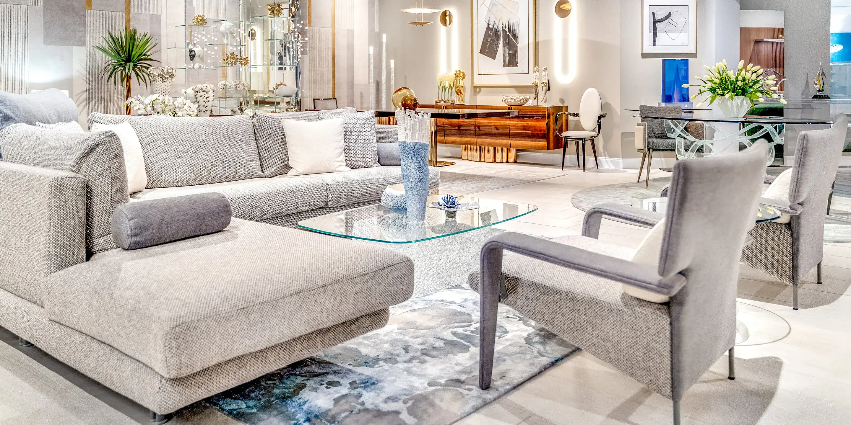 Modern contemporary living room furniture with stylish seating and glass coffee table.
