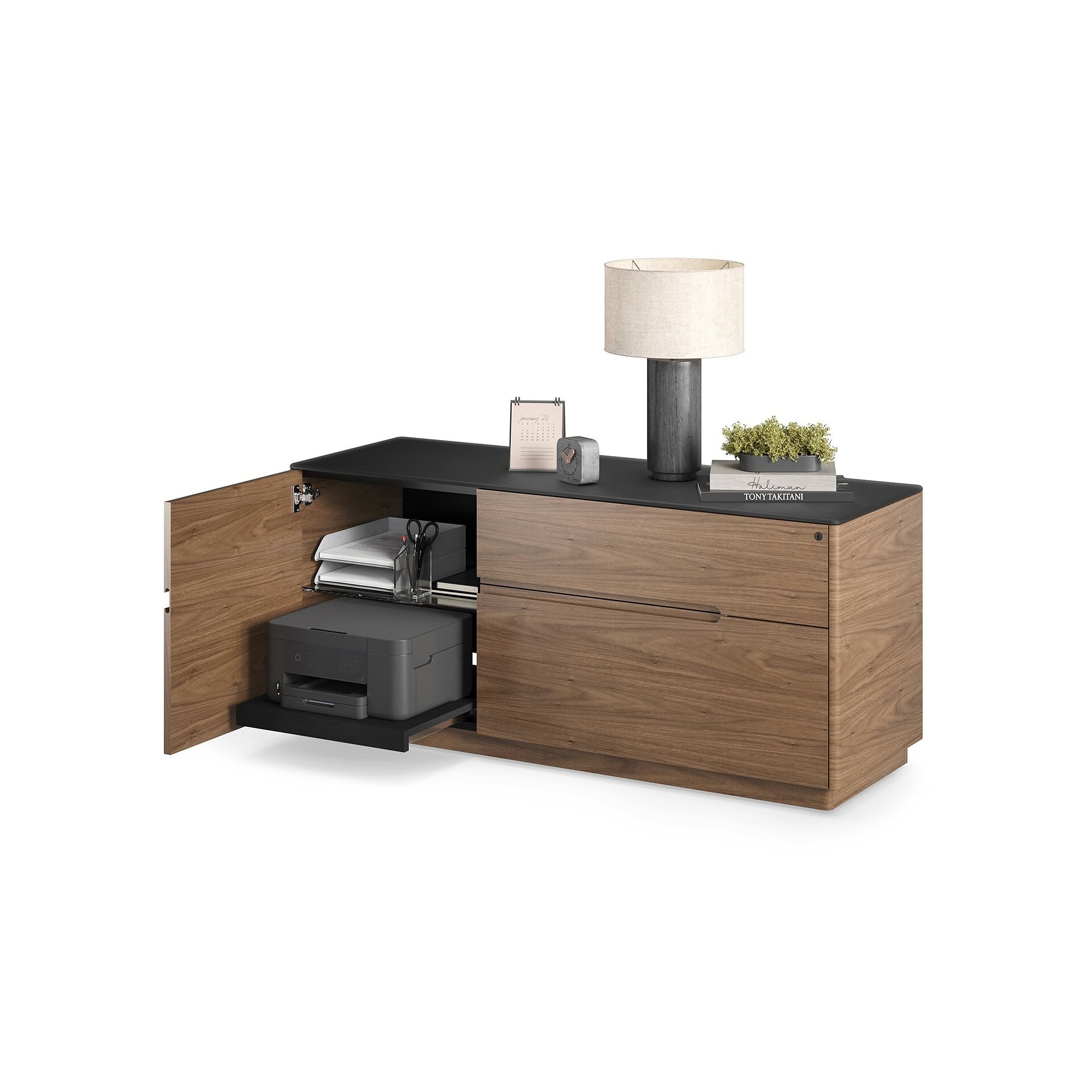 Modern wooden storage cabinet with black countertop and office accessories.
