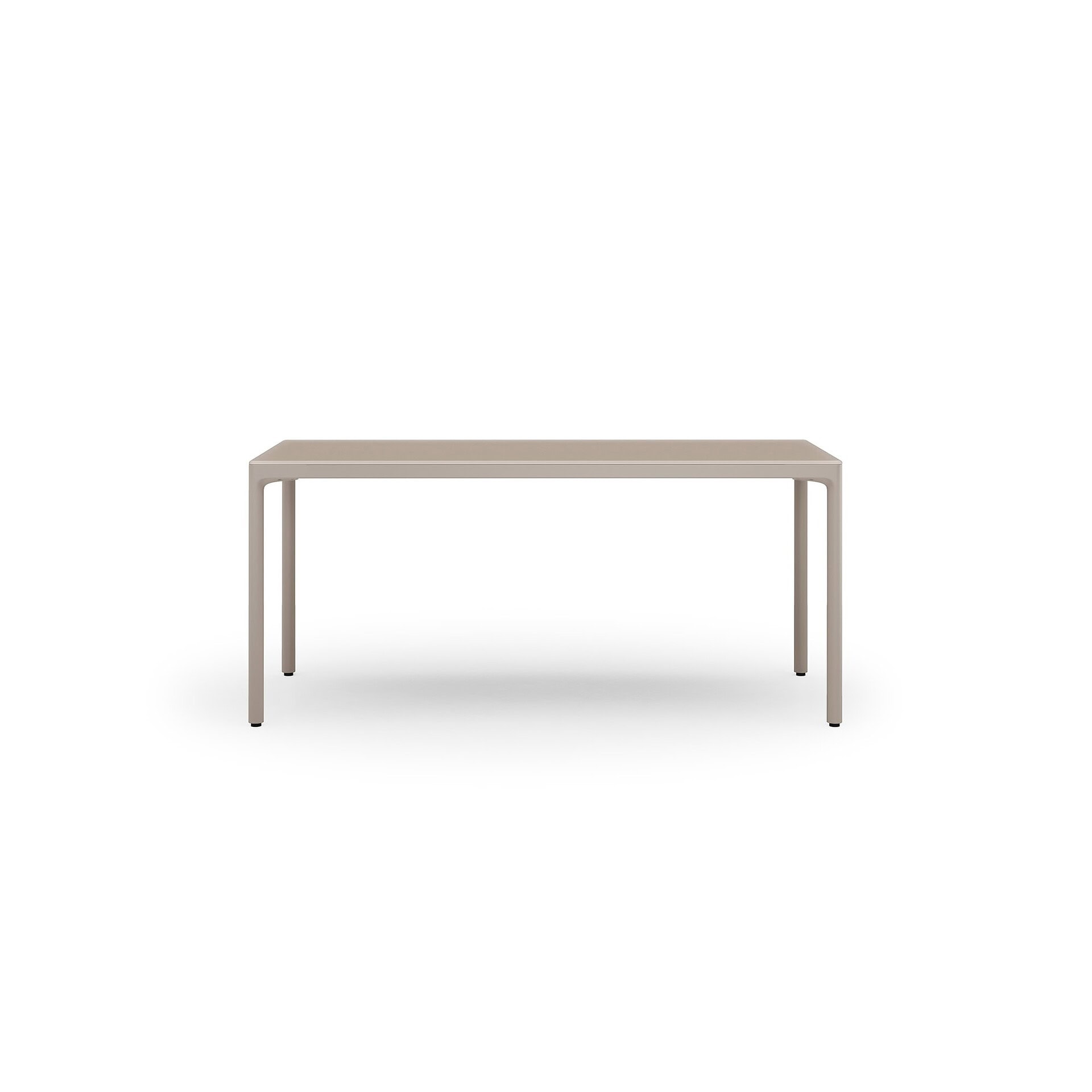 Contemporary beige dining table with sleek minimalist design for modern interiors.
