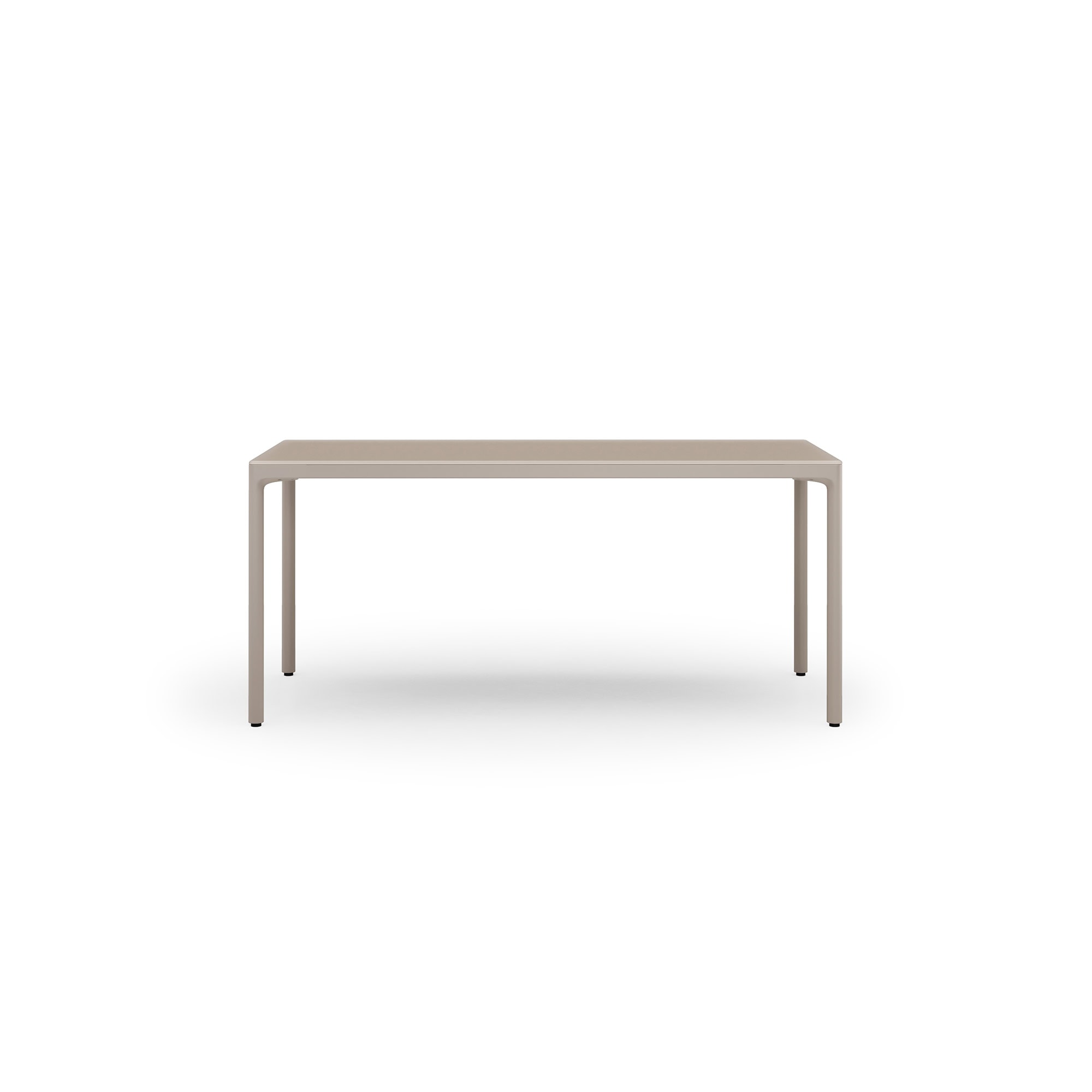 Contemporary beige dining table with sleek minimalist design for modern interiors.