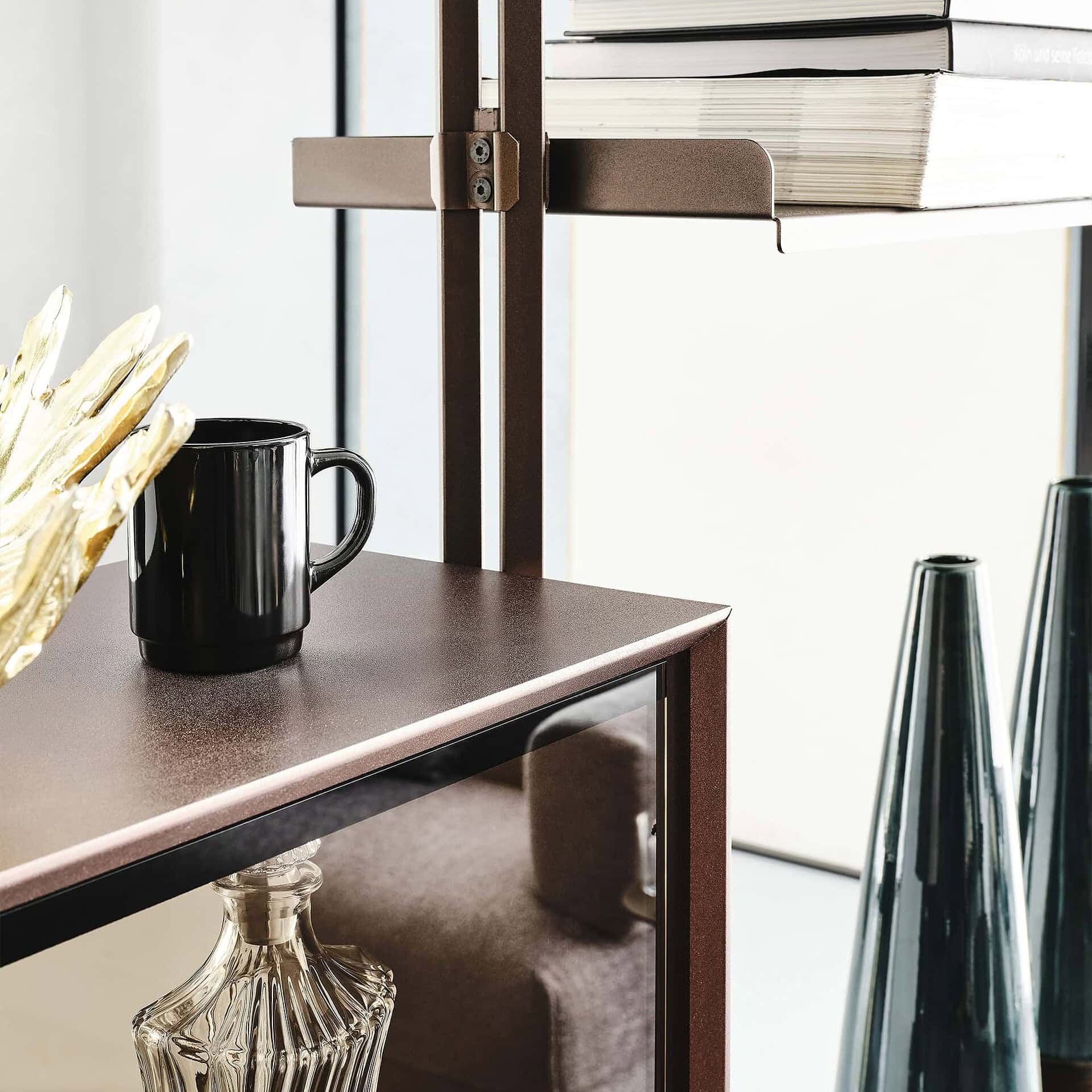Stylish modern shelving unit with metal frame and wood shelves, perfect for home decor and organization.