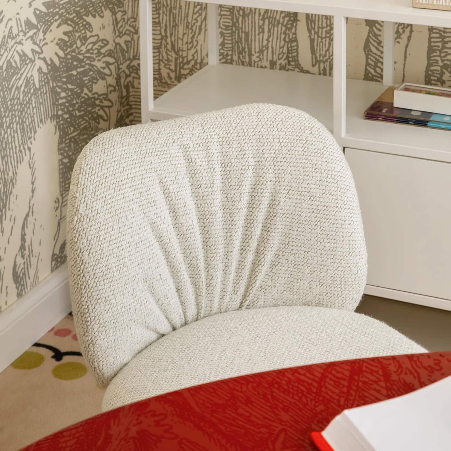 Soft textured white accent chair from Sklar Furnishings, perfect for modern living spaces.