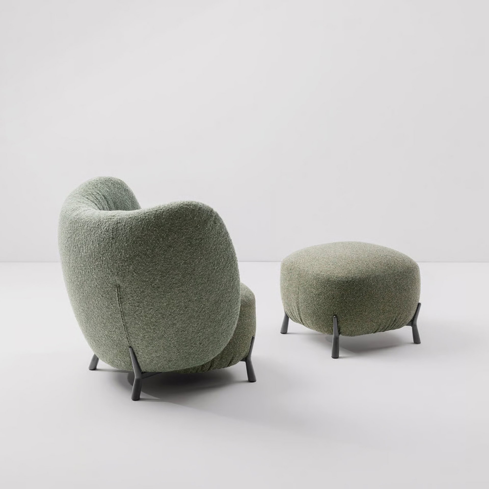 Modern green upholstered lounge chair and ottoman set by Sklar Furnishings.