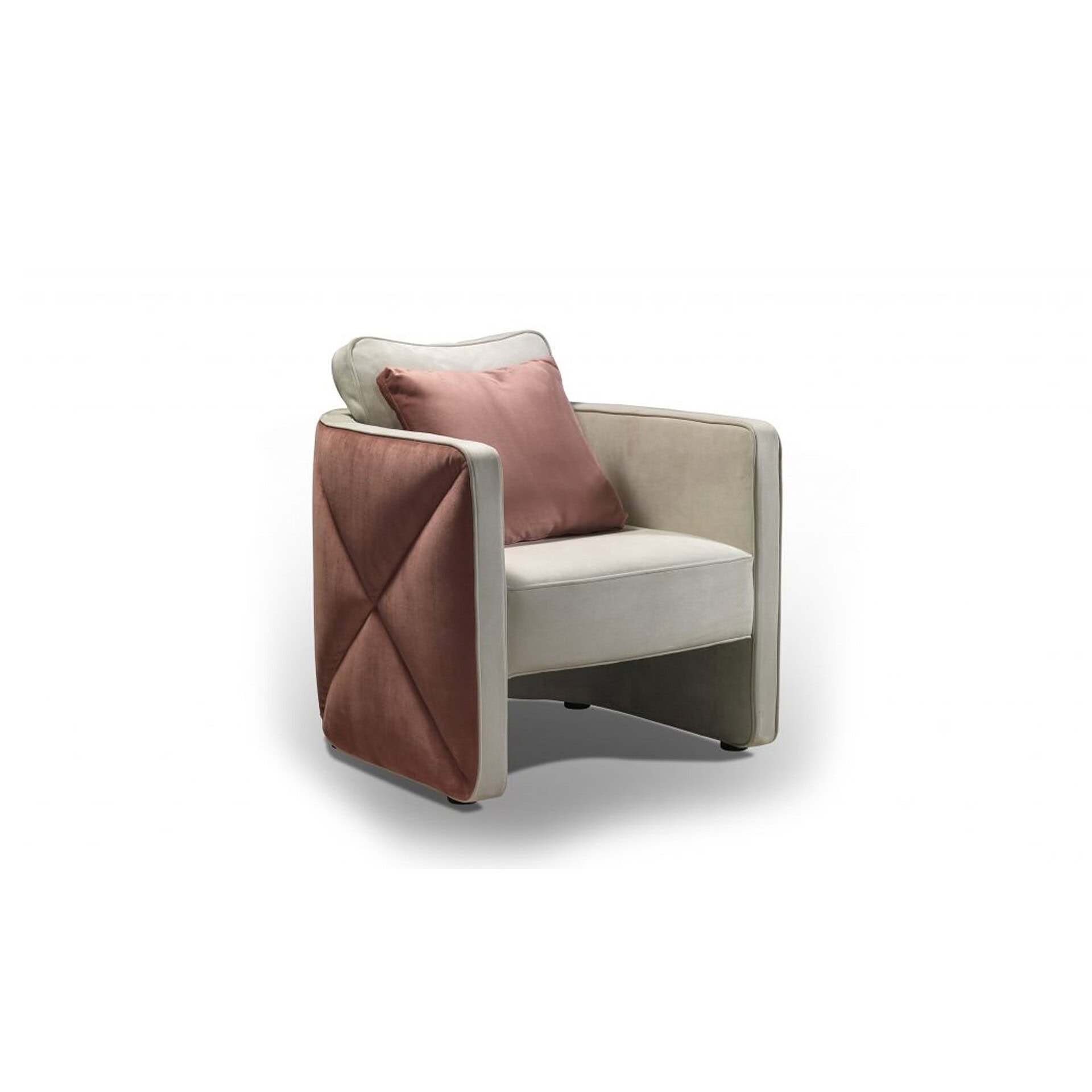 Luxurious cream armchair with pink velvet pillows and a blush throw for elegant home decor.