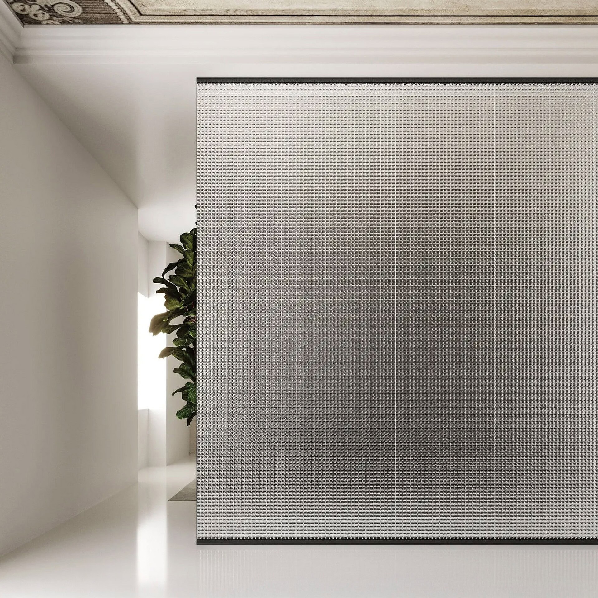 Sleek modern perforated metal room divider with green plant accents, stylish and functional.
