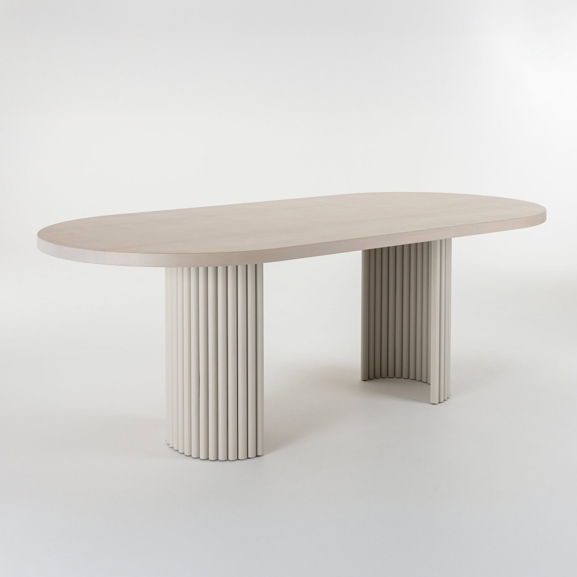 Elegant contemporary wood dining table with unique curved shape and textured base for stylish dining.