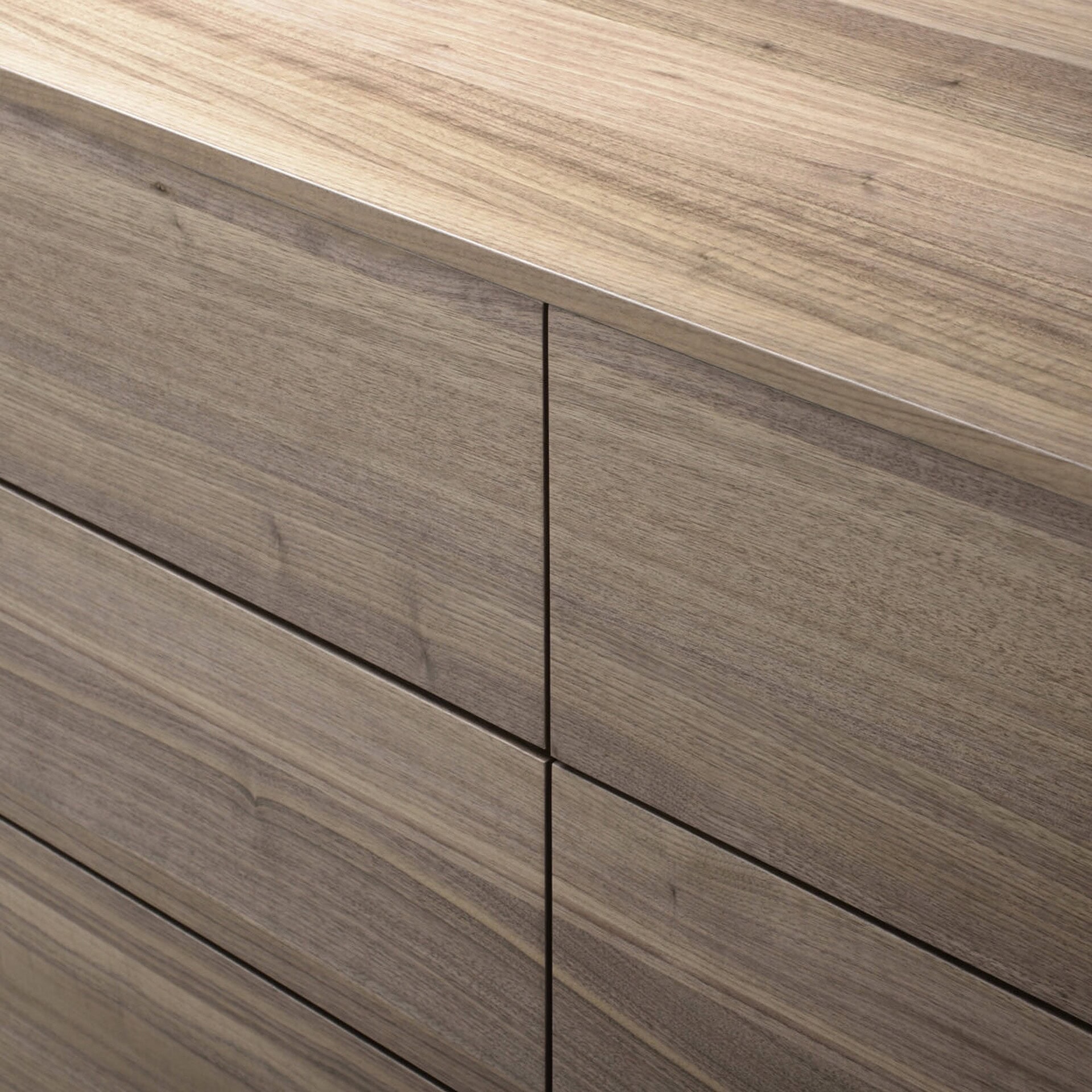 Sleek wooden dresser featuring natural oak finish, modern storage, and minimalist design.