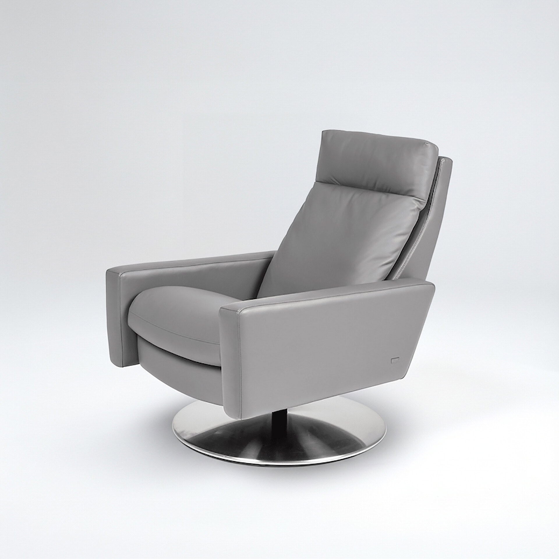 Gray recliner chair with sleek design and comfortable cushioning.