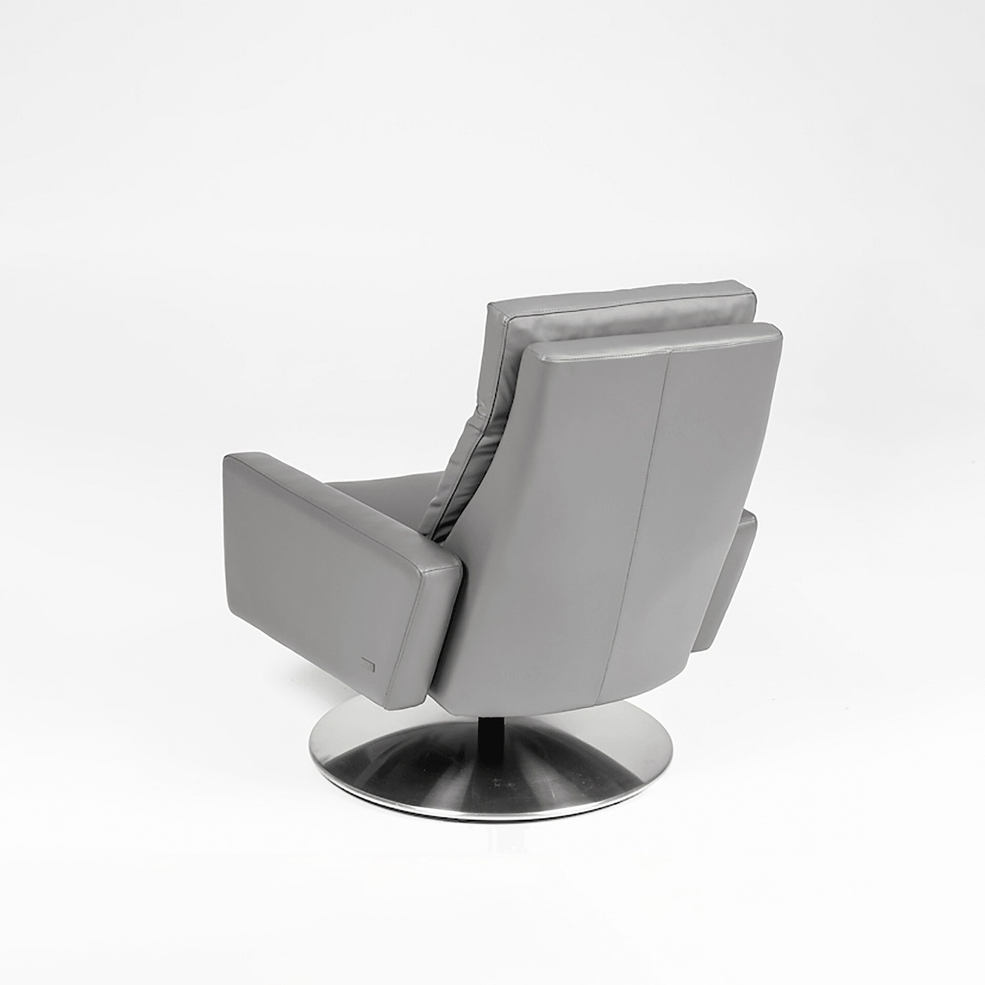 Recliner chair in sleek gray upholstery, perfect for contemporary living room decor.