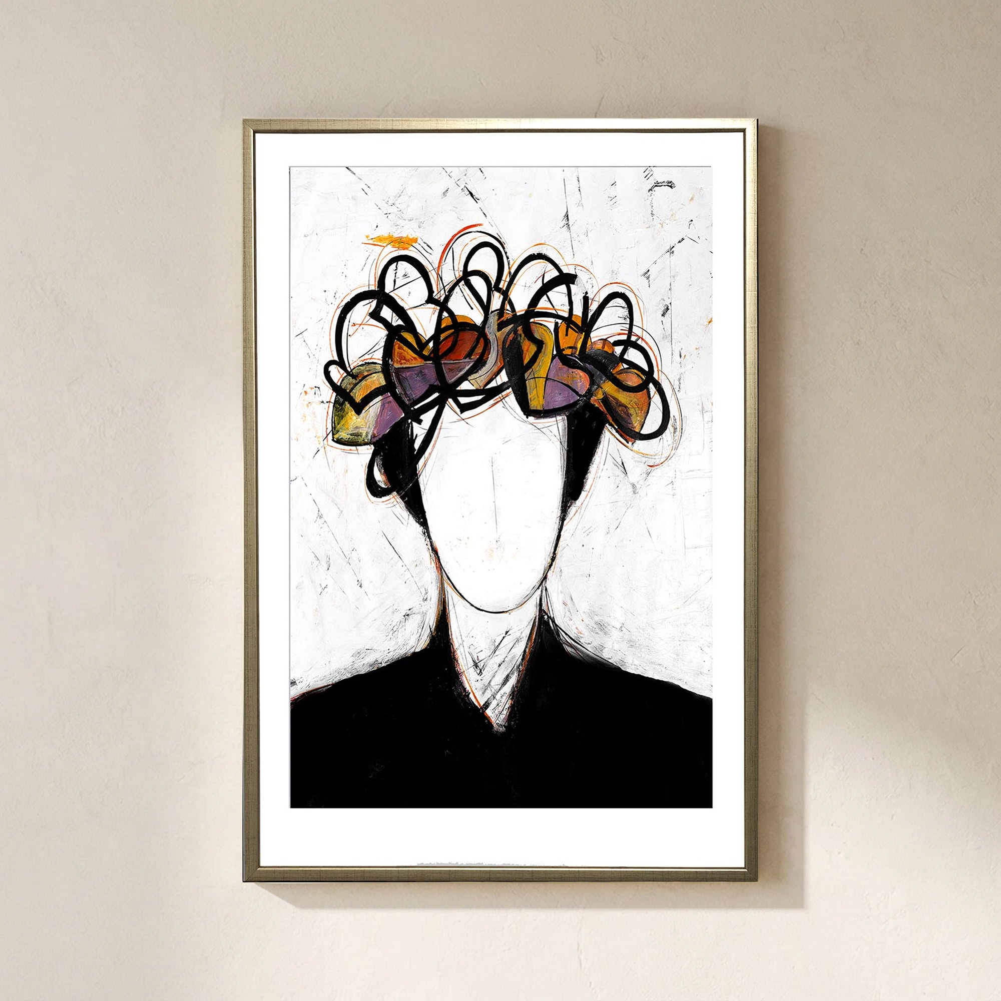 A framed abstract portrait on a beige wall, featuring a faceless figure with a white face and a vibrant, chaotic crown of black swirling lines and colorful abstract shapes in yellow, orange, red, and purple.