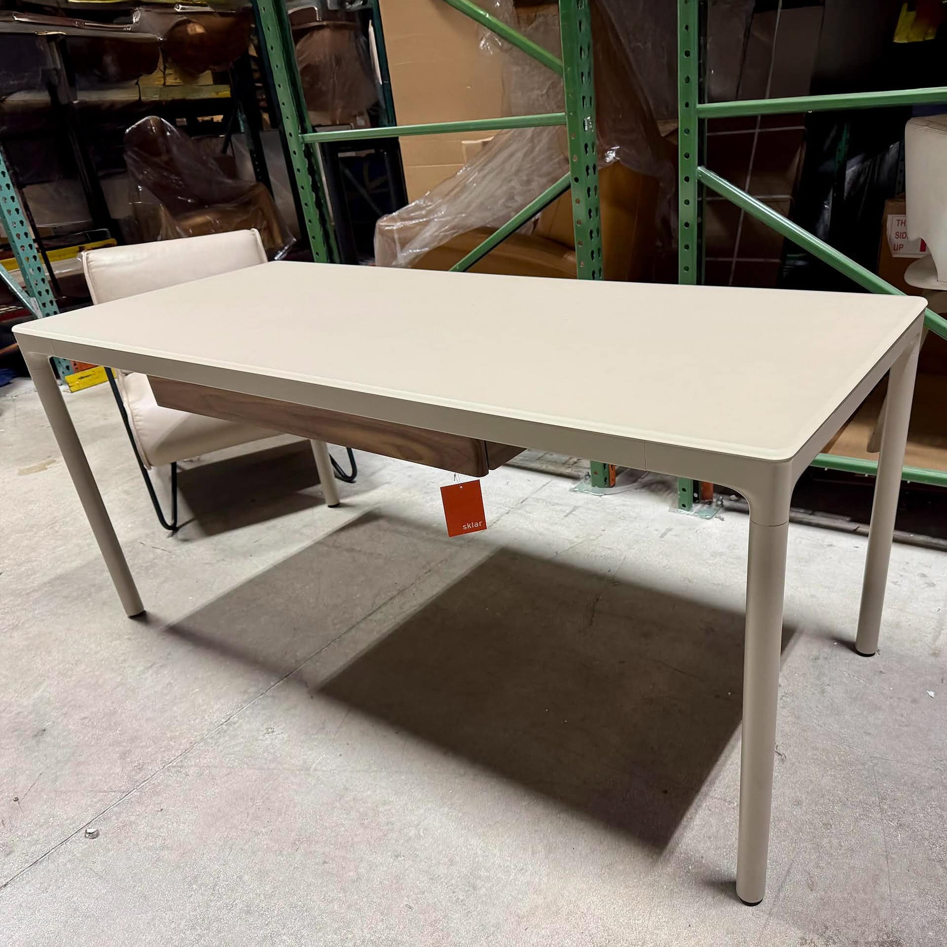 Stylish white dining table featuring minimalist design, perfect for contemporary homes.