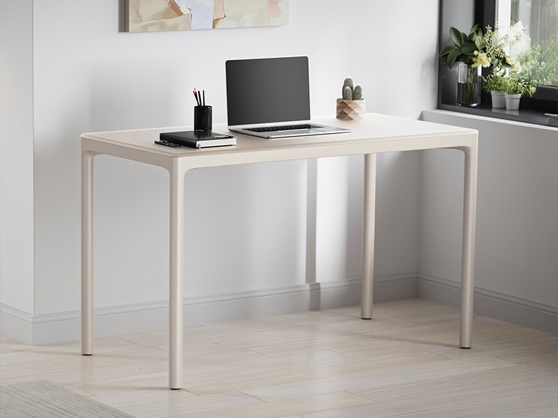 Modern white desk with sleek design for home office or workspace.