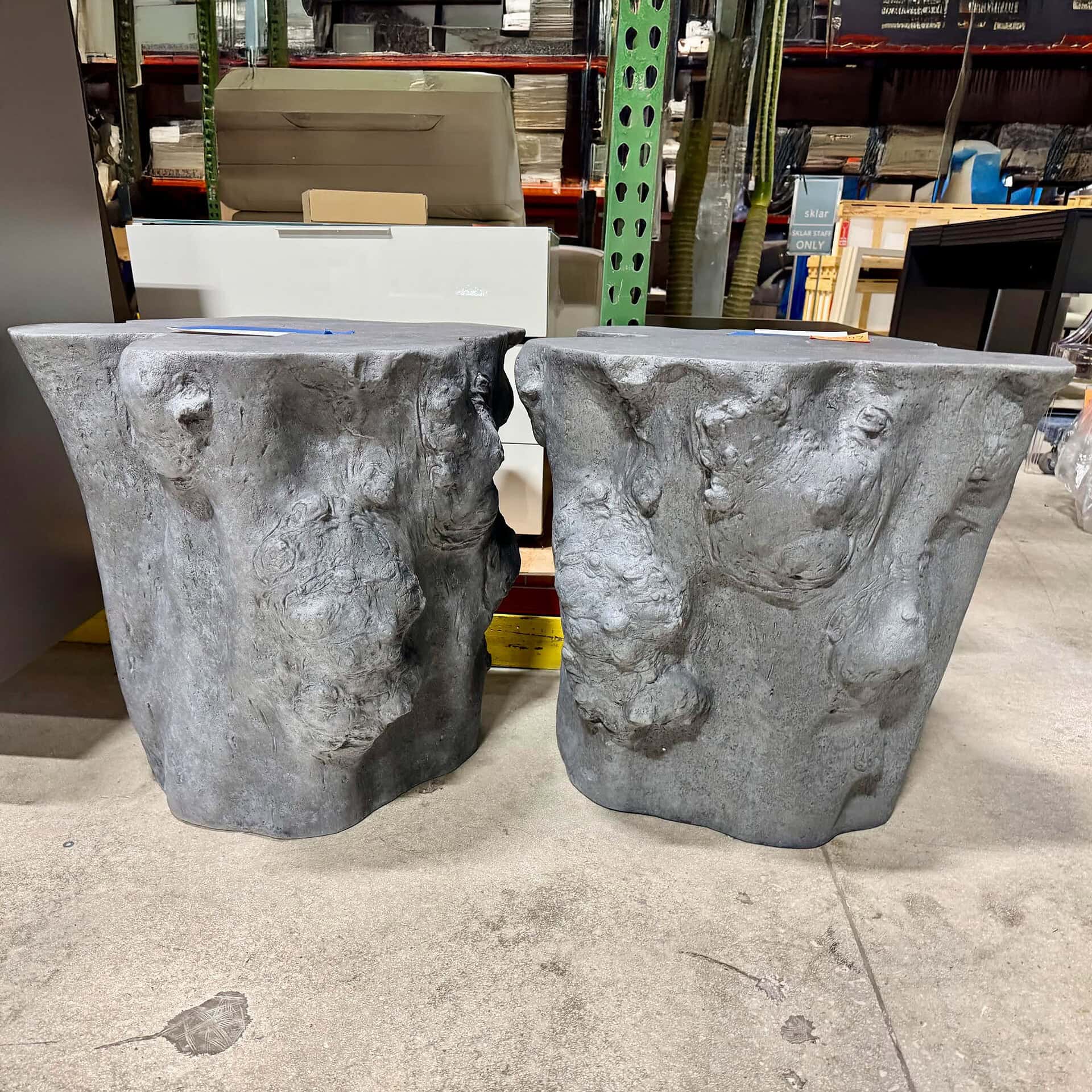 Unique handcrafted concrete side tables with a natural stone appearance, perfect for modern or rustic decor.