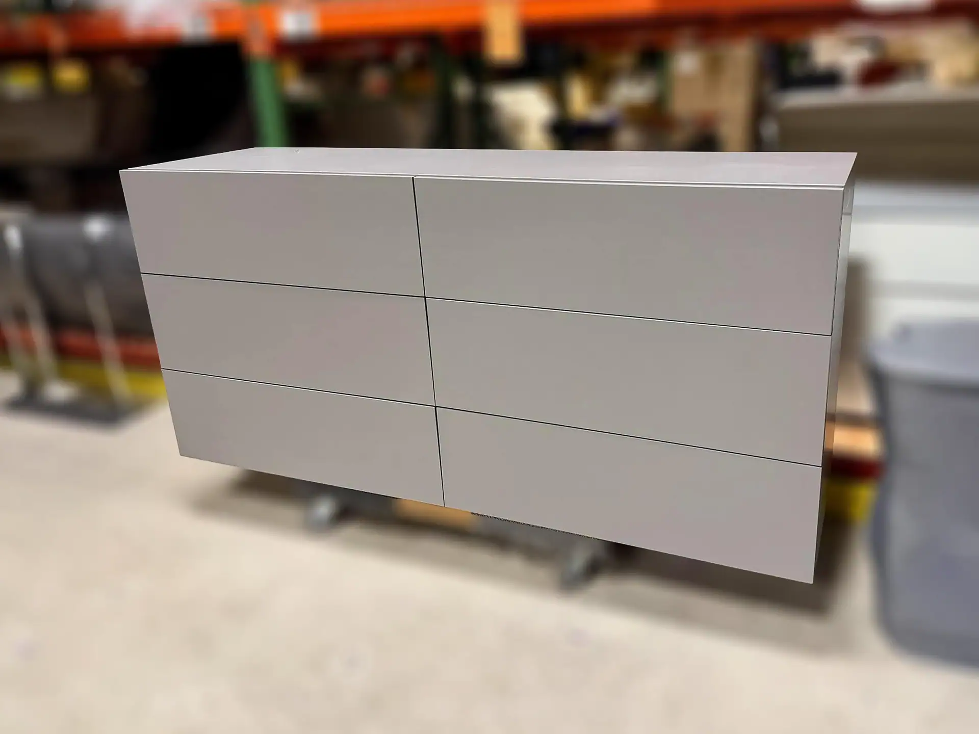 Clean white modern dresser with six drawers, minimalist design, ideal for contemporary interiors.