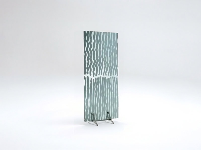 High-quality decorative glass panel with wave pattern for stylish interior design.