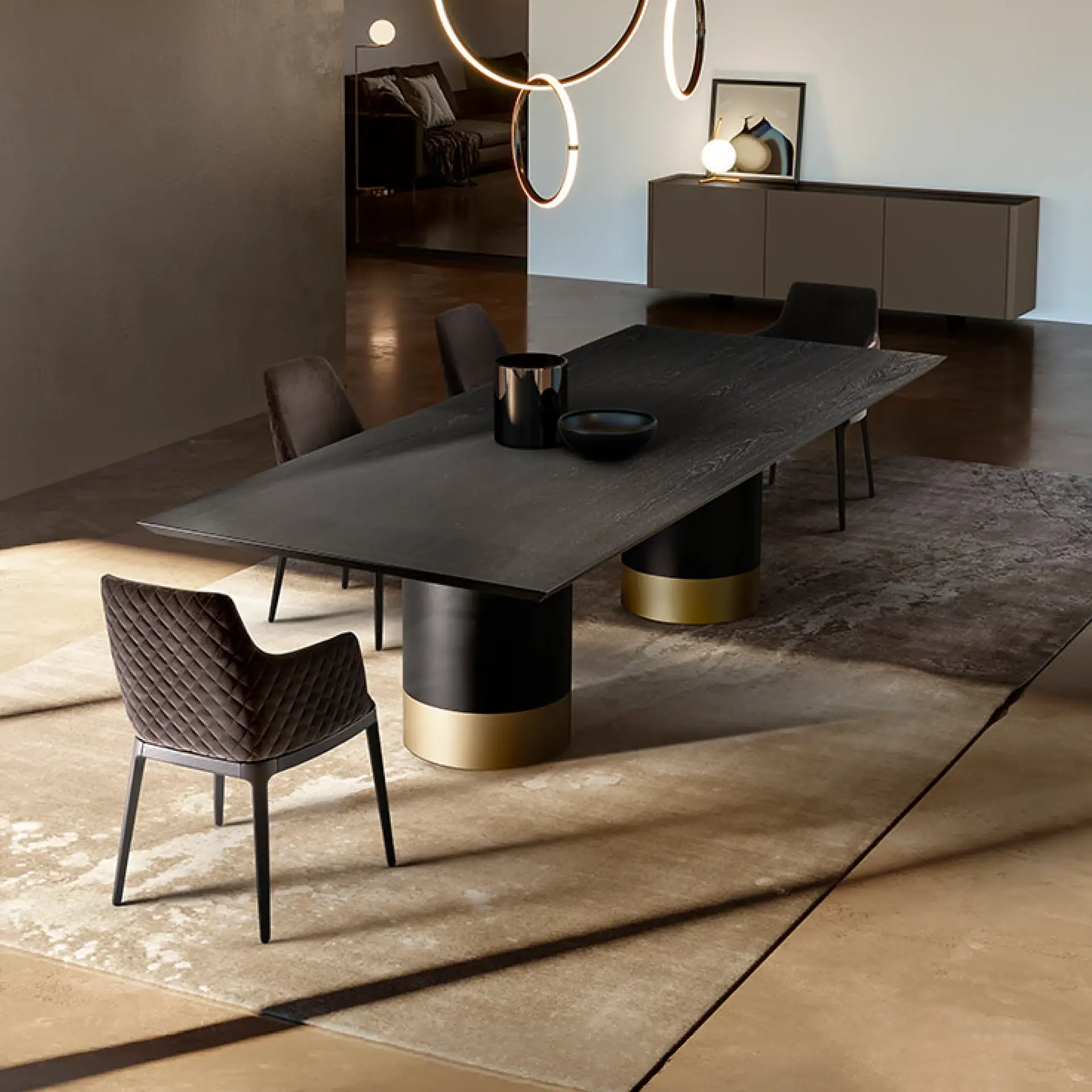 Sklar Furnishings Cilindro dining table in a modern dining room setting.