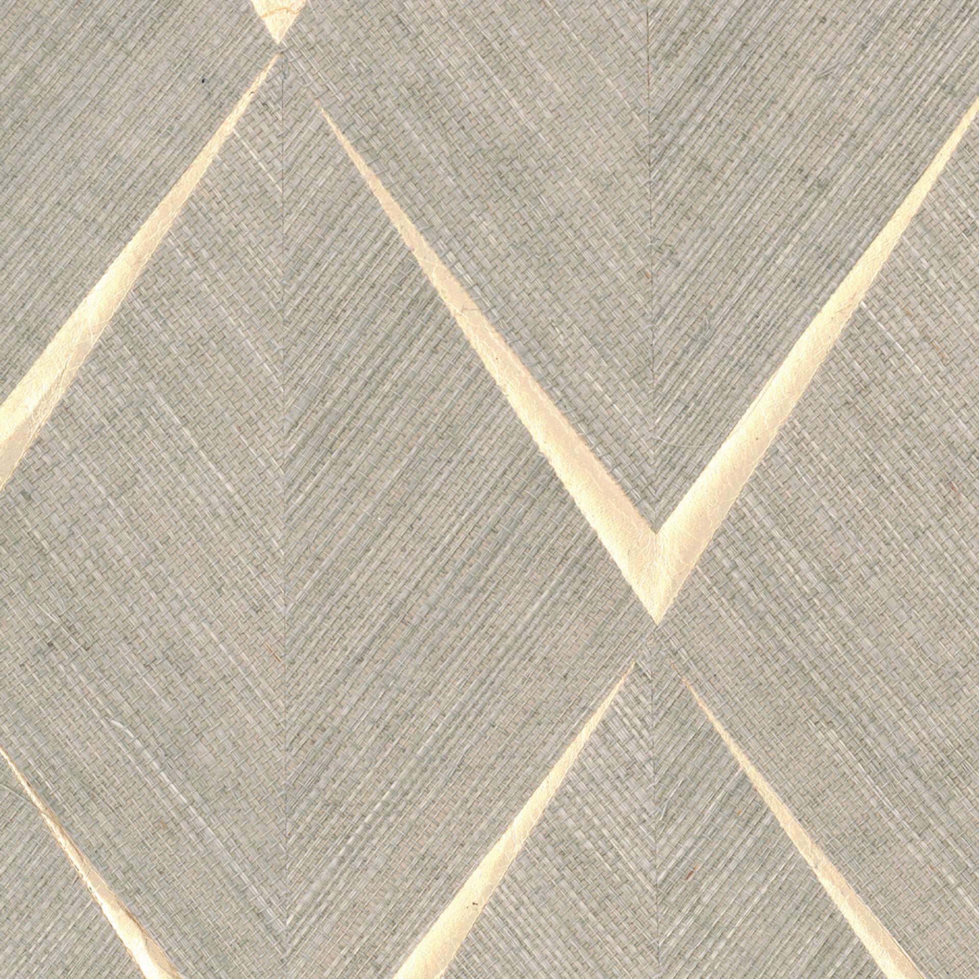 A textured surface featuring a light grey-beige woven pattern with golden diagonal lines forming a geometric design.