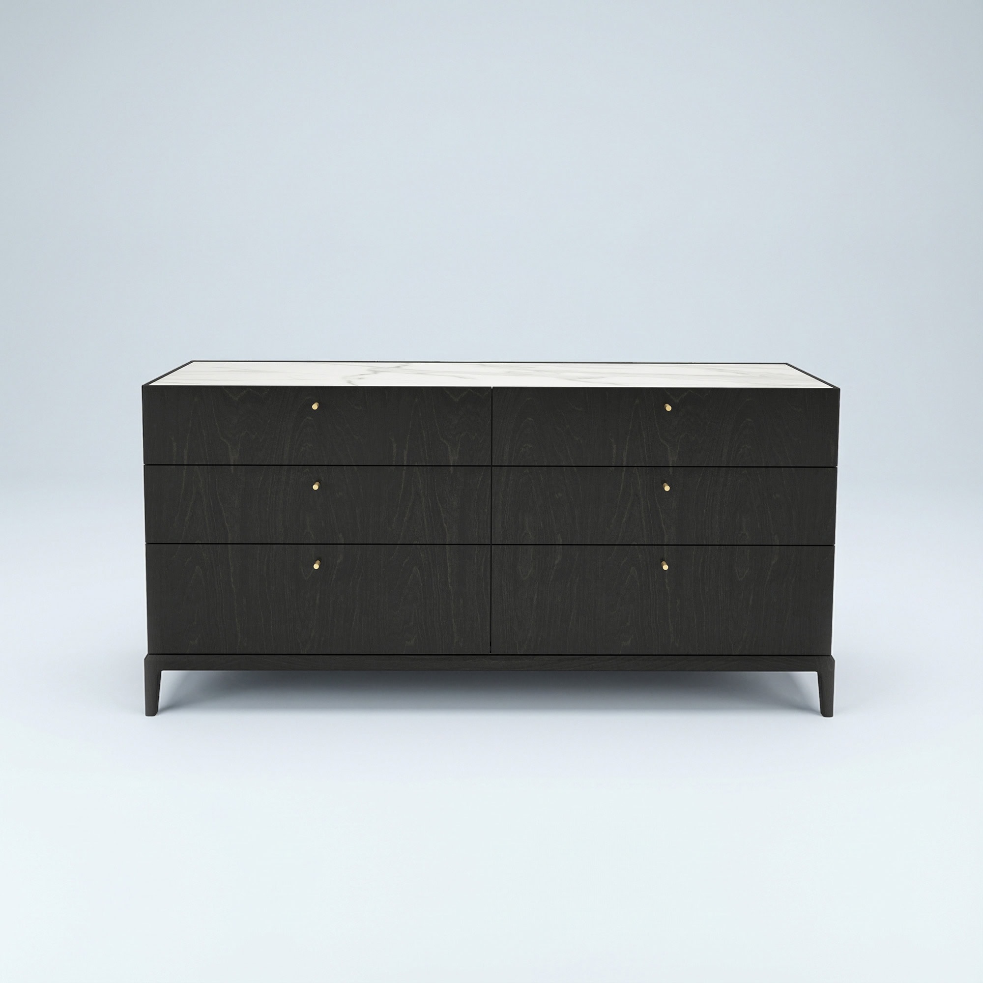 A modern, dark wood dresser with a white marble top and six drawers, each featuring a small brass knob, against a light blue-gray background.