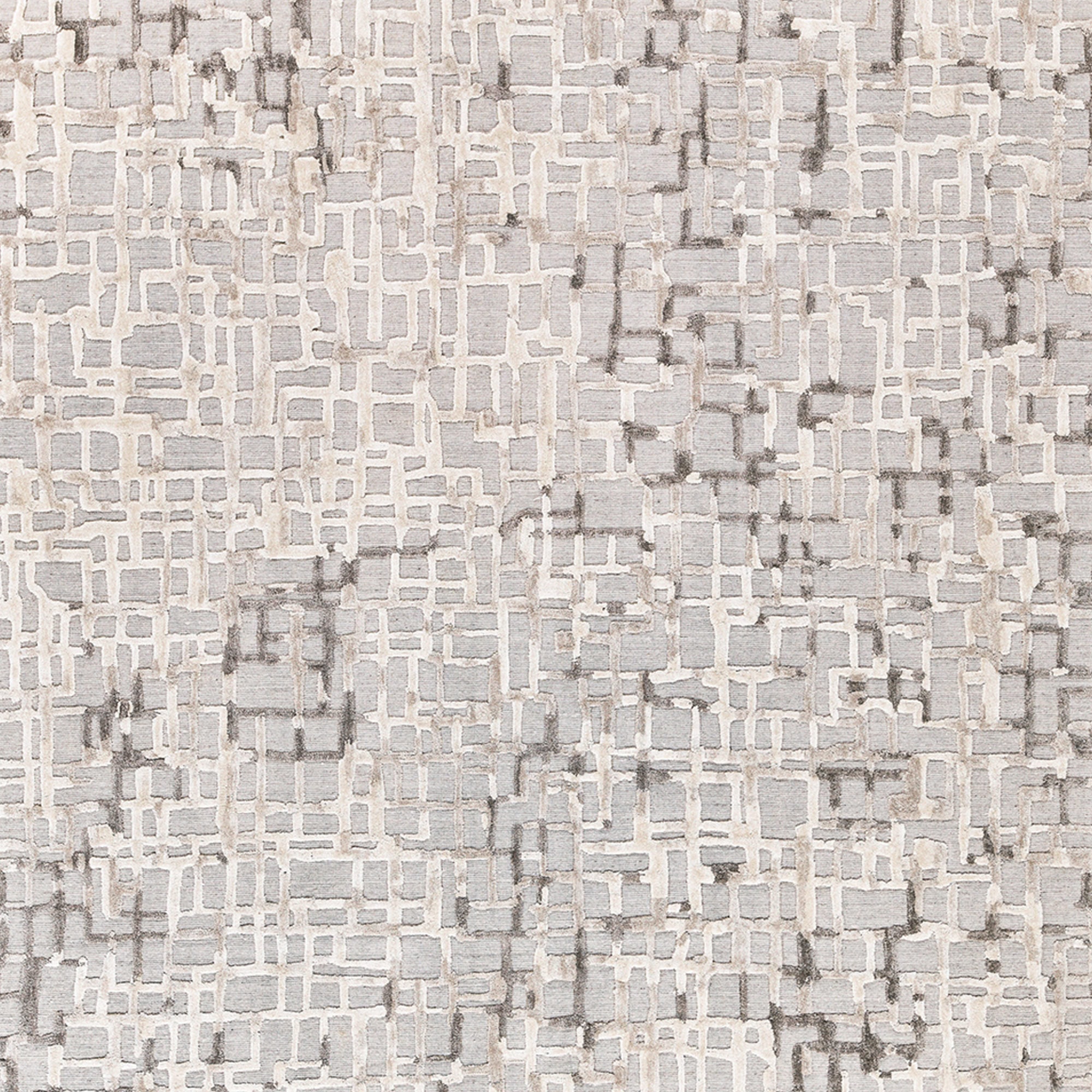 Intricate geometric pattern on a neutral-toned rug, showcasing modern and stylish home decor by Sklar Furnishings.