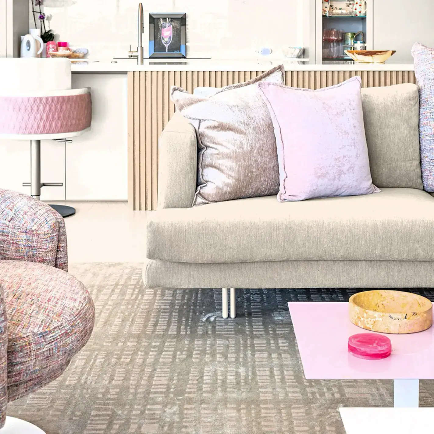 Elegant living room with plush pillows and contemporary decor.