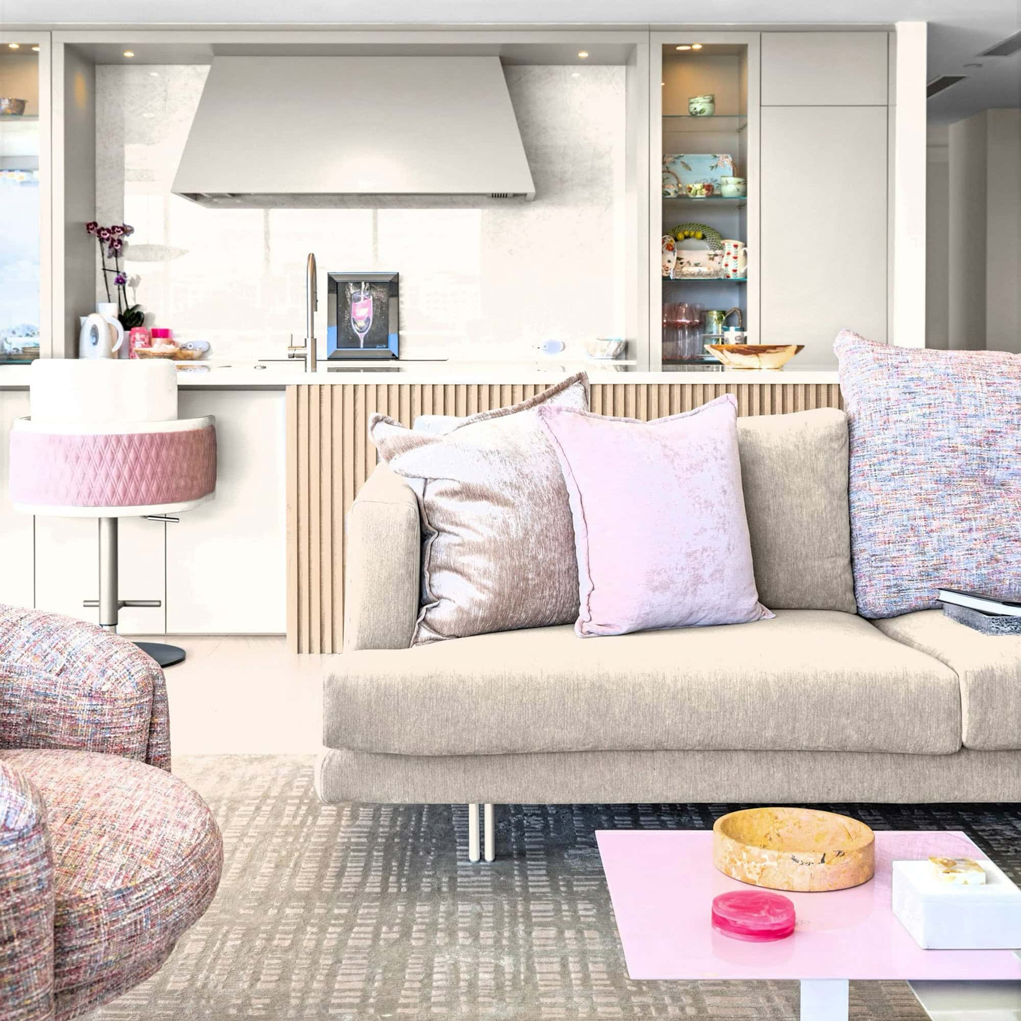 personalized-condo-from-top-to-bottom-case-study-7.3-1 Elegant living room with plush pillows and contemporary decor.