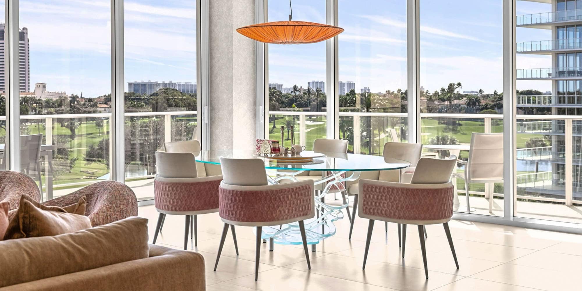 personalized-condo-from-top-to-bottom-case-study-8.3 Contemporary condo dining space featuring elegant furniture and large windows showcasing cityscape v.