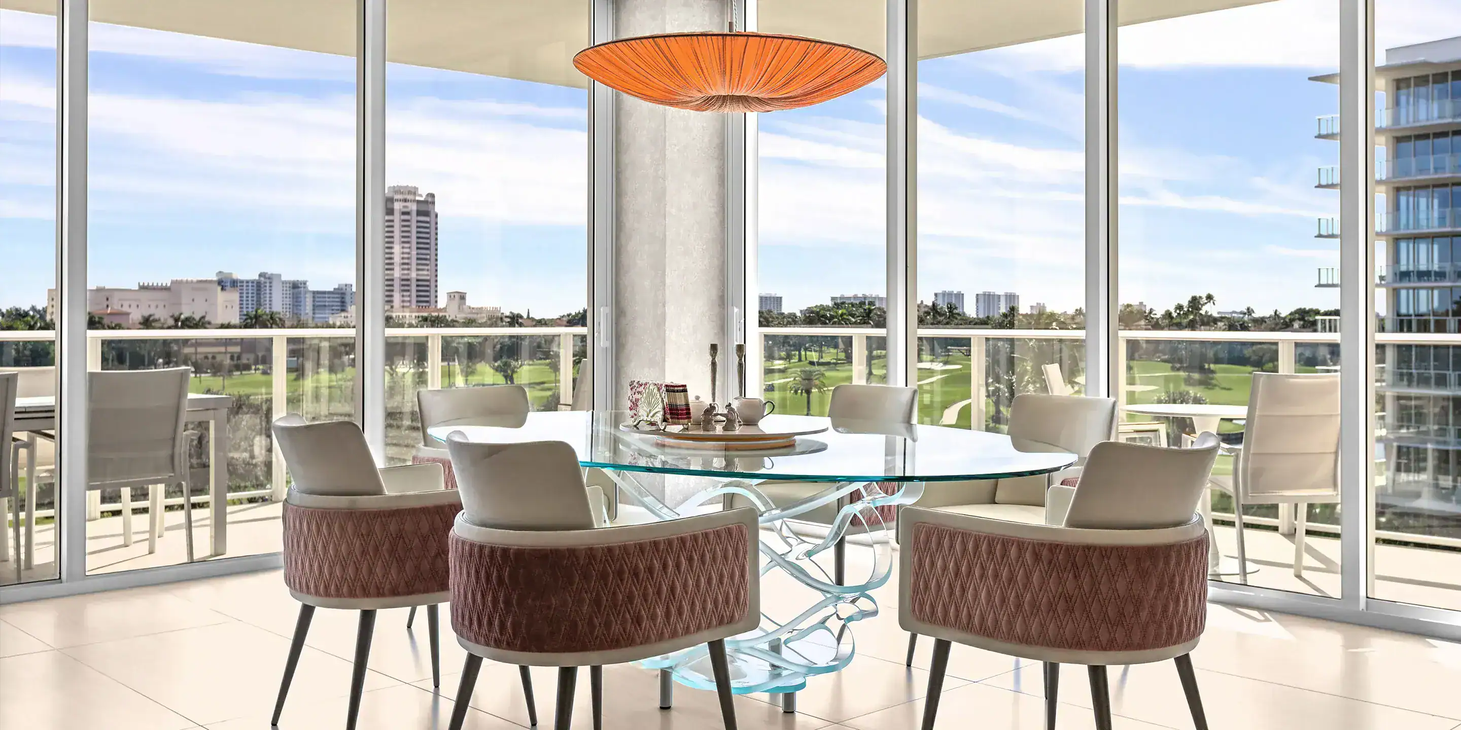 personalized-condo-from-top-to-bottom-case-study-8.3 Contemporary condo dining space featuring elegant furniture and large windows showcasing cityscape v.