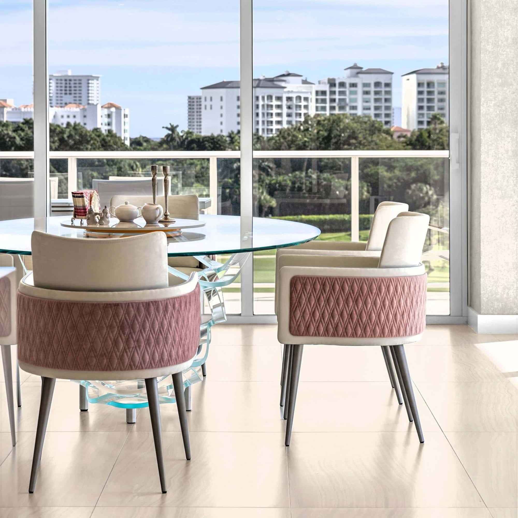Modern condo dining area with city view and stylish furniture. Elegant condo dining space with contemporary furniture and scenic cityscape backdrop.