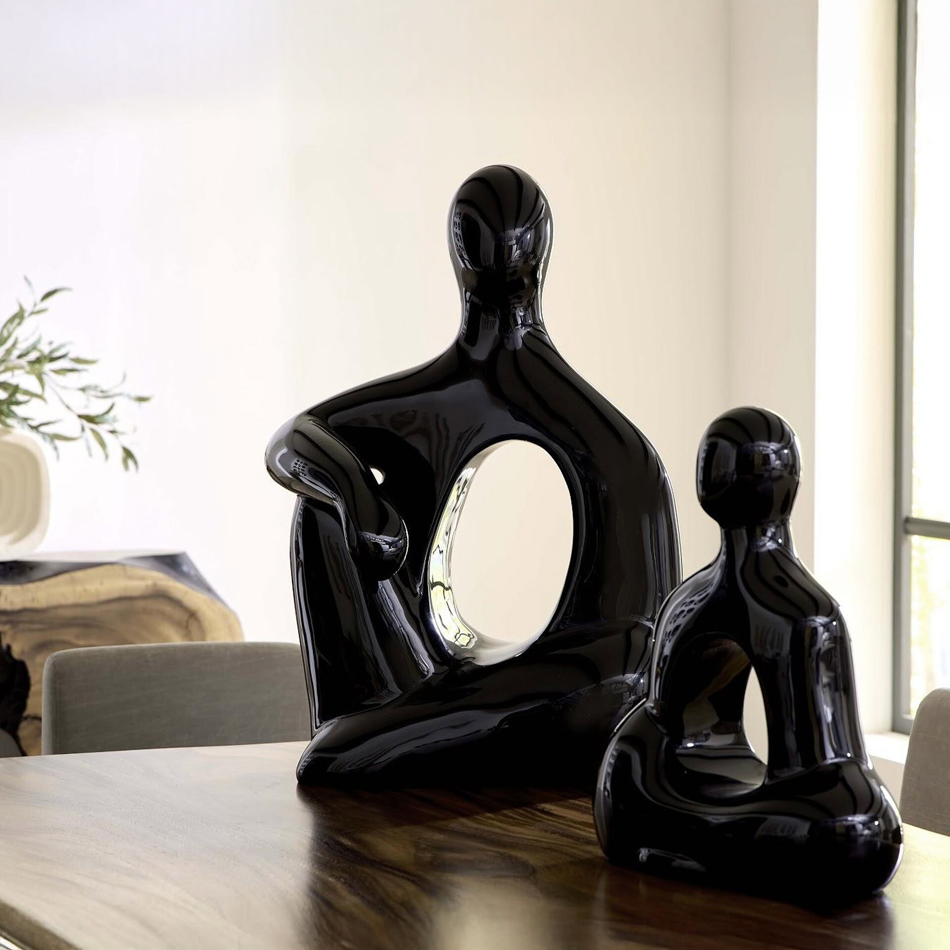 Unique black sculpture art piece showcasing modern design and style.