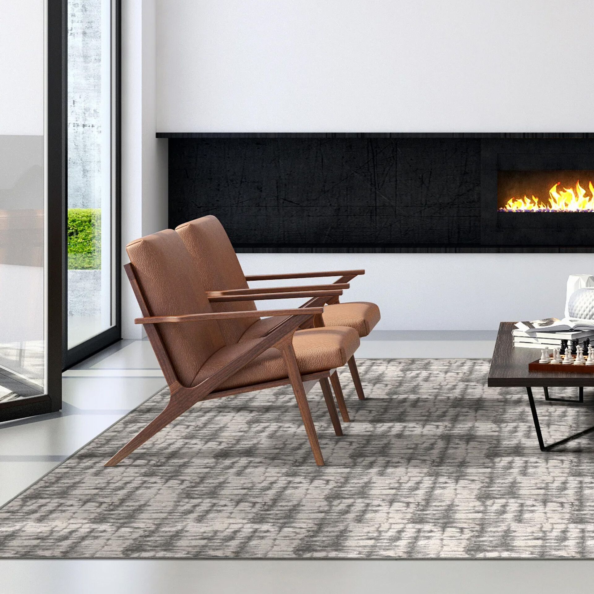 A modern living room with two tan leather armchairs, a grey patterned rug, a linear fireplace with flames, and a coffee table with a chessboard.