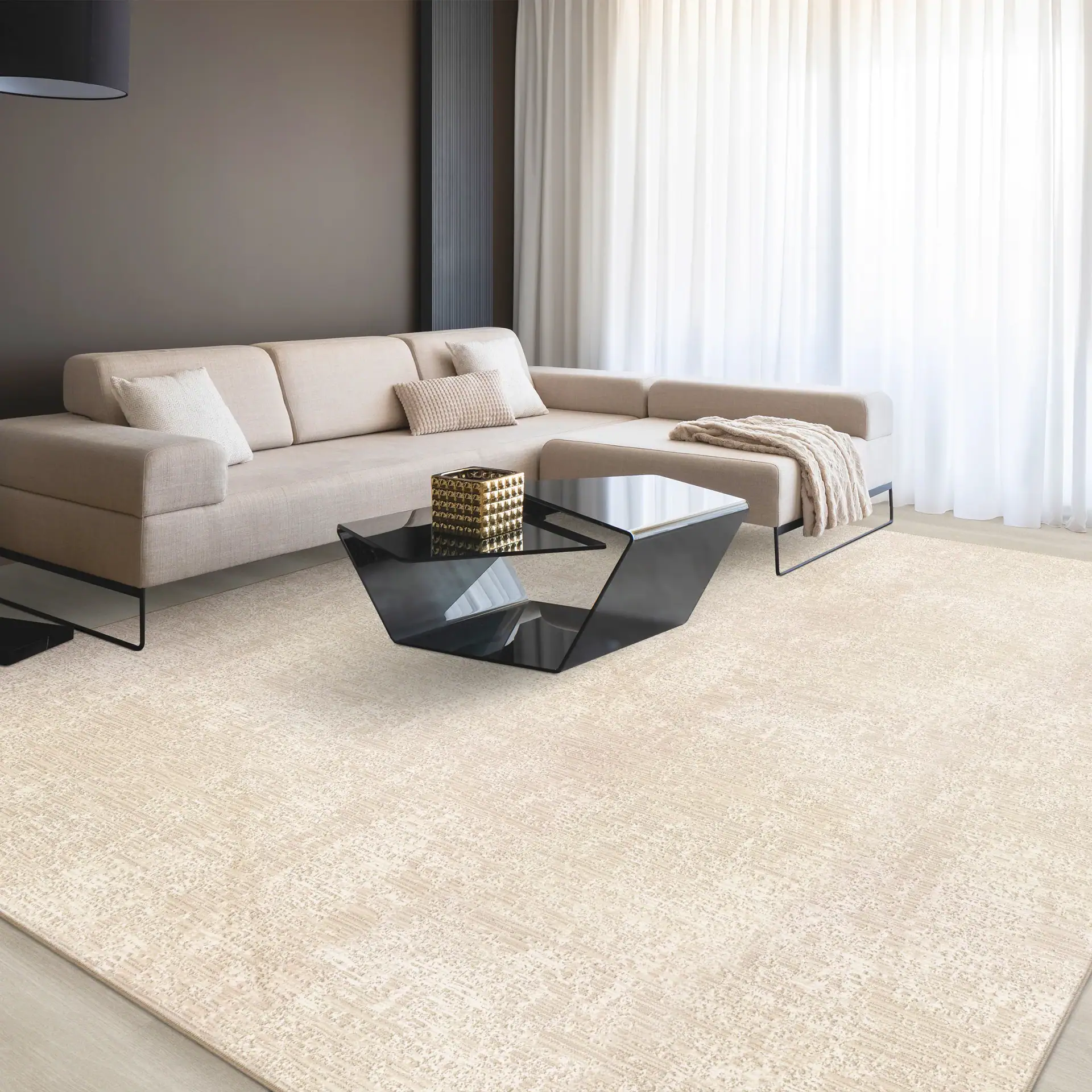 Luxurious living room featuring a contemporary beige sofa, stylish coffee tables, and soft white curtains.