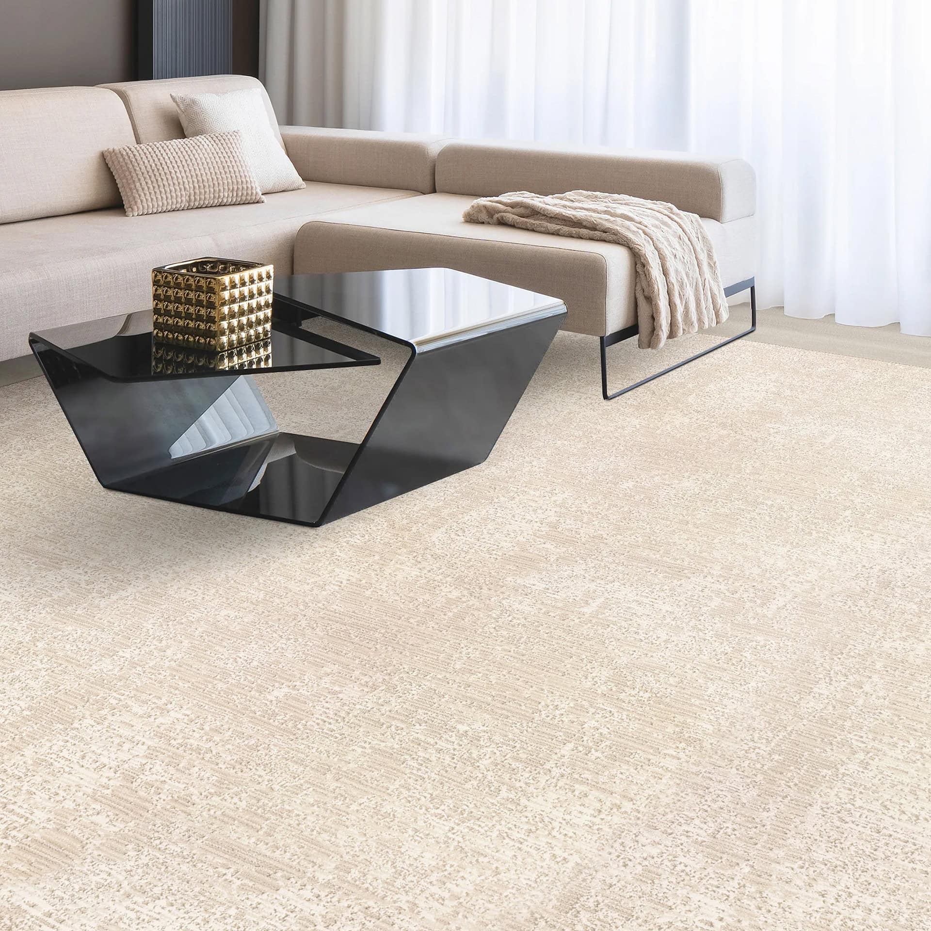 Luxurious living room featuring a contemporary beige sofa, stylish coffee tables, and soft white curtains.