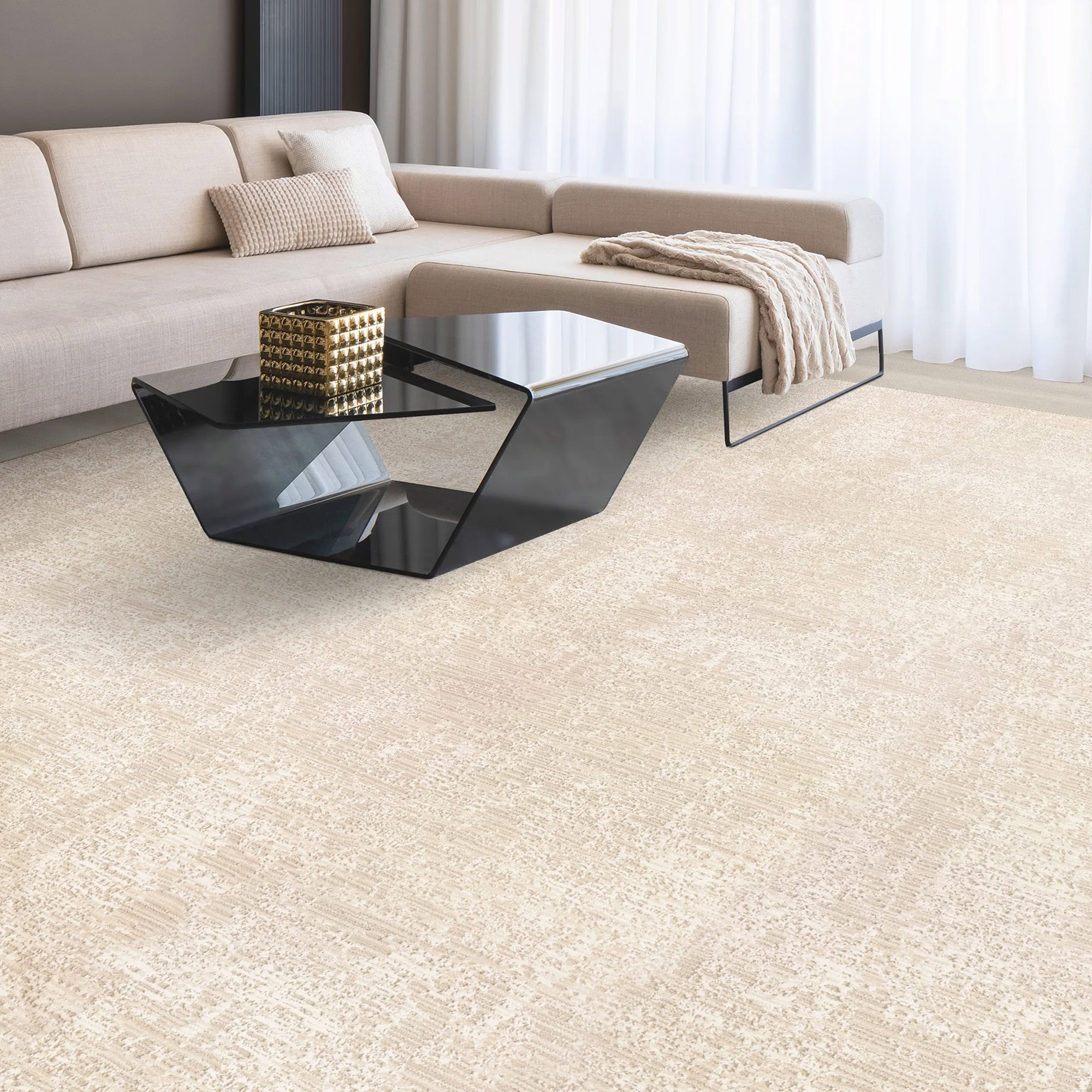 Luxurious living room featuring a contemporary beige sofa, stylish coffee tables, and soft white curtains.