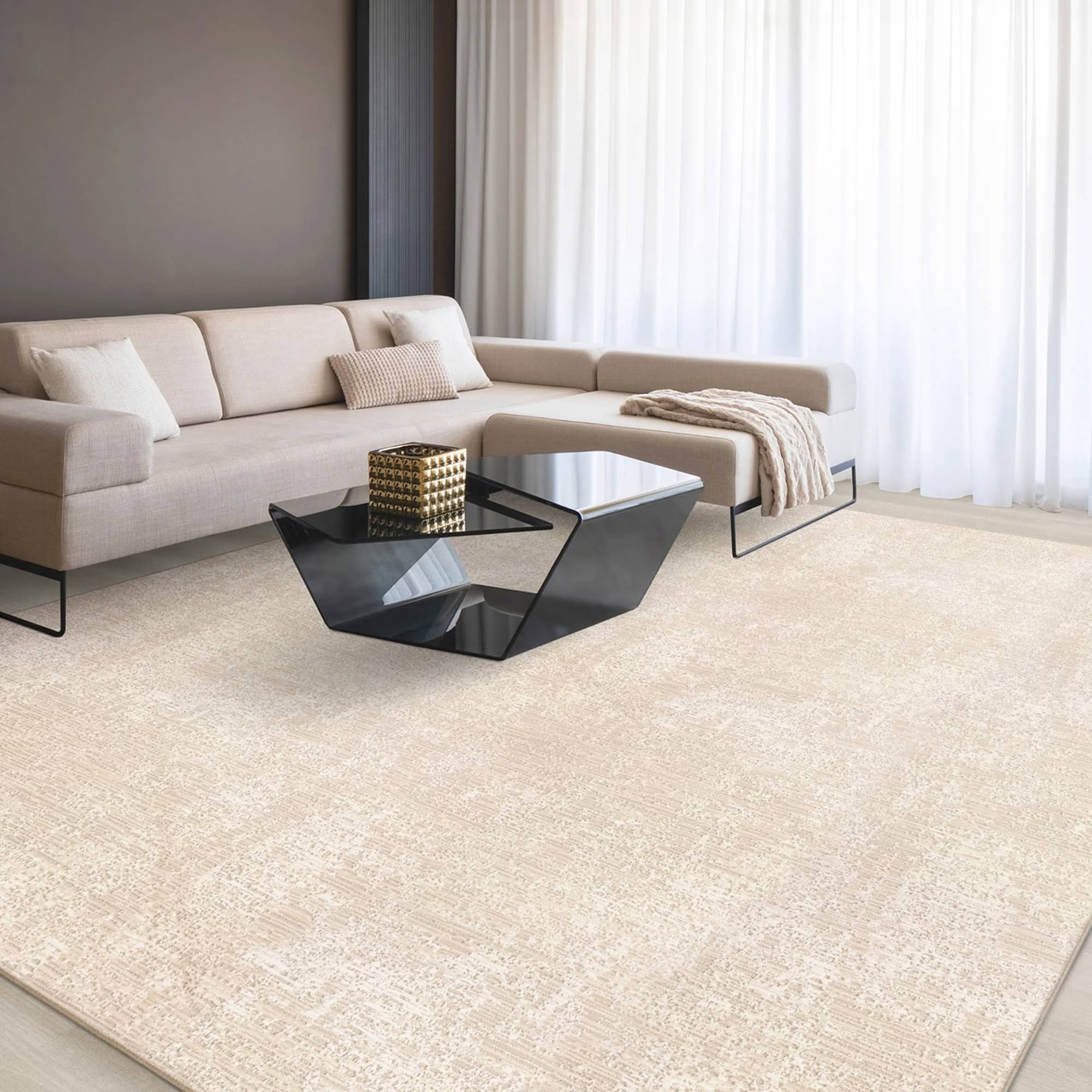 Luxurious living room featuring a contemporary beige sofa, stylish coffee tables, and soft white curtains.