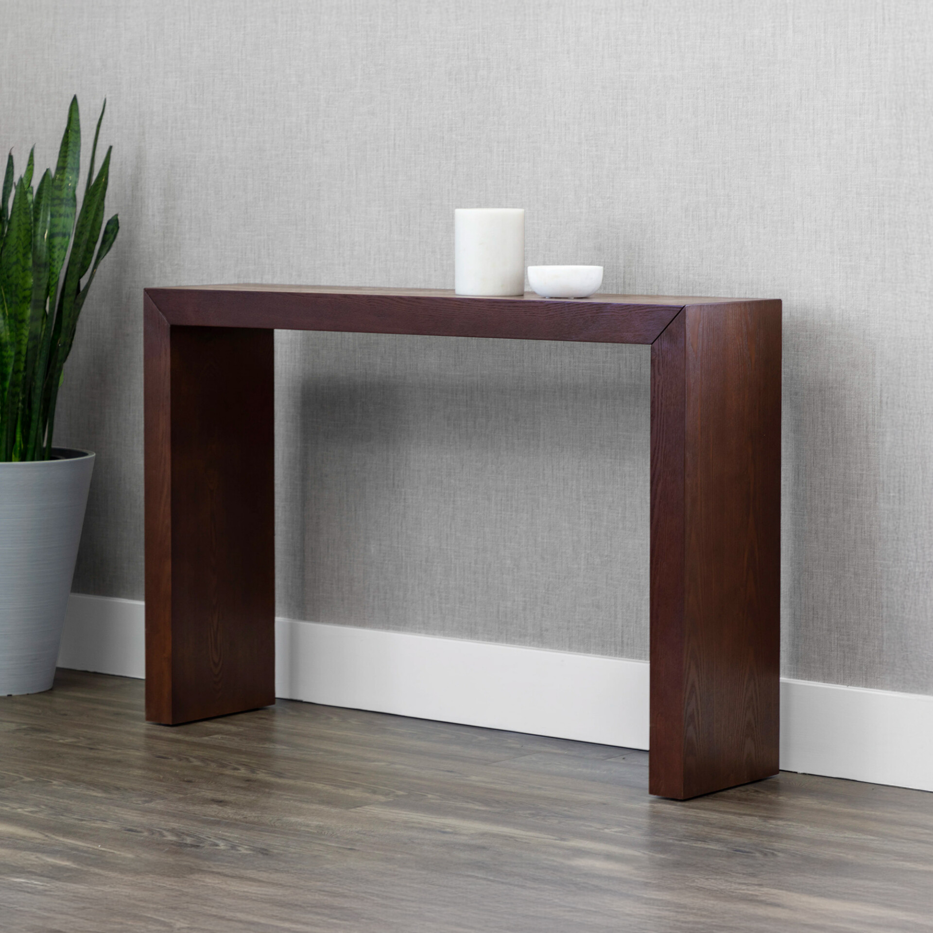 Contemporary wooden console table with clean lines, ideal for entryways or living rooms.