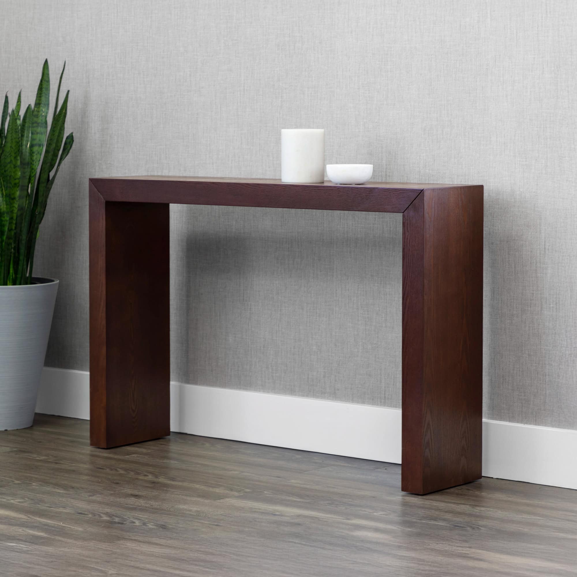 Contemporary wooden console table with clean lines, ideal for entryways or living rooms.