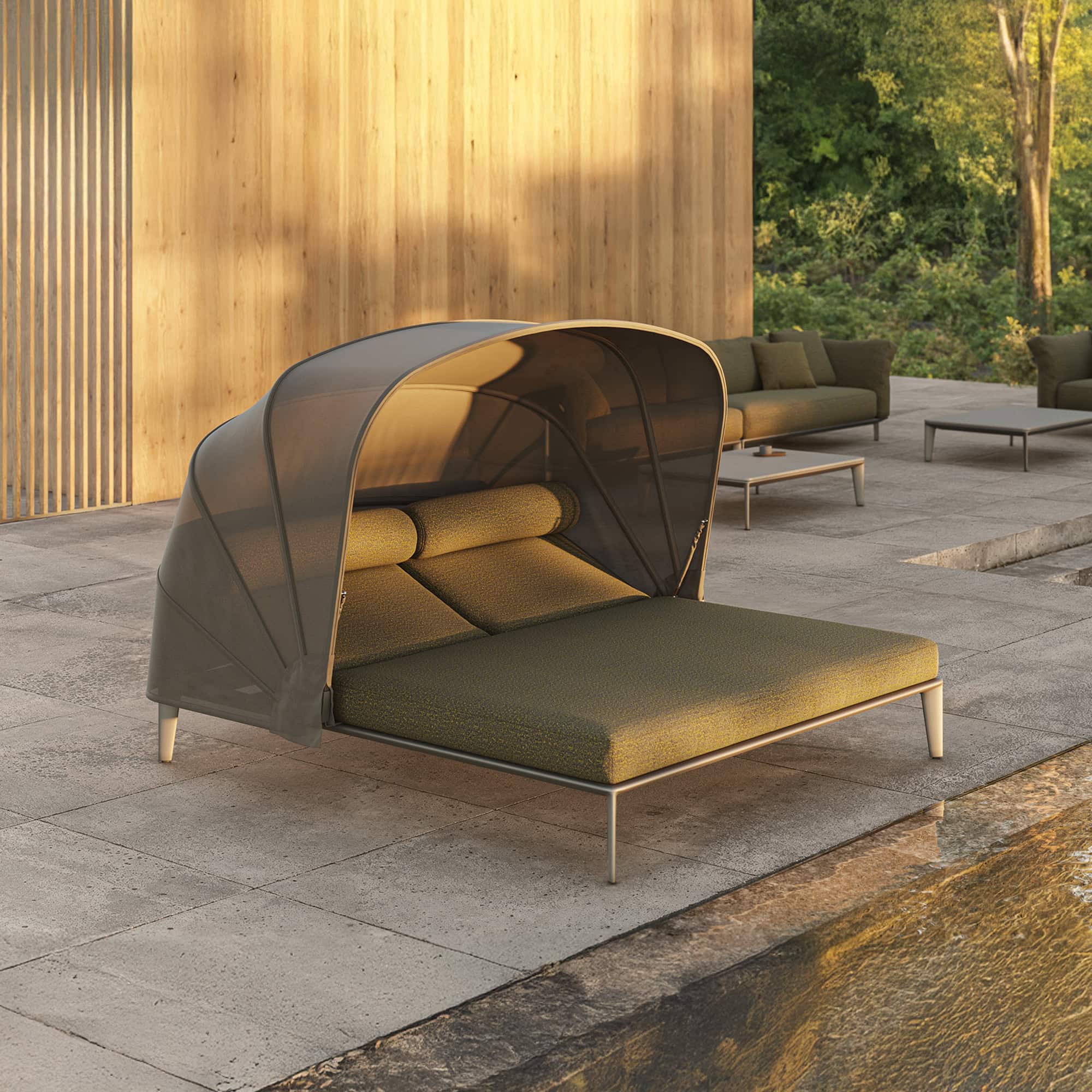 Comfortable outdoor daybed with modern design and weather-resistant canopy, perfect for luxury outdoor lounge.