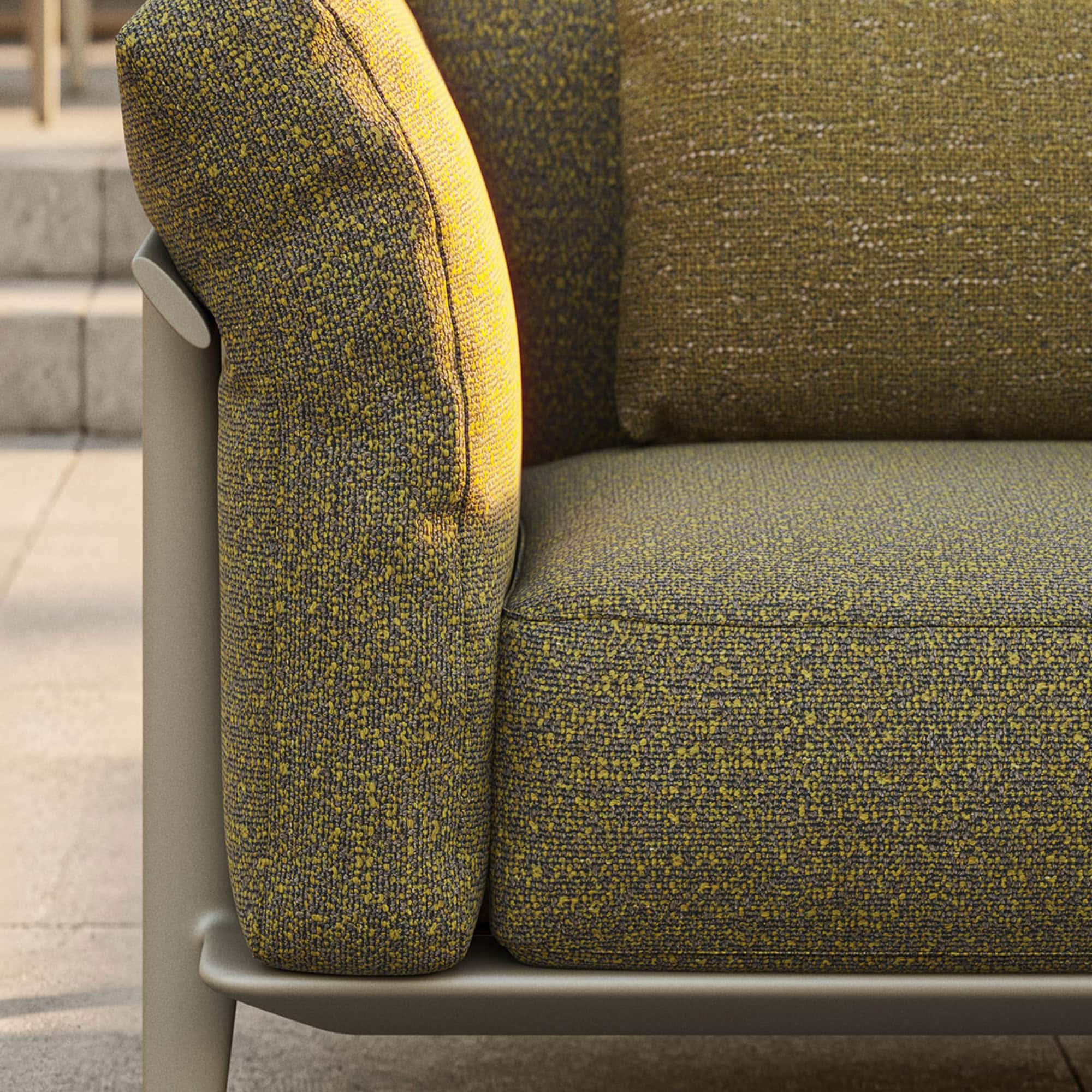 Vibrant yellow and gray upholstered modern sofa with sleek, minimalist beige frame.