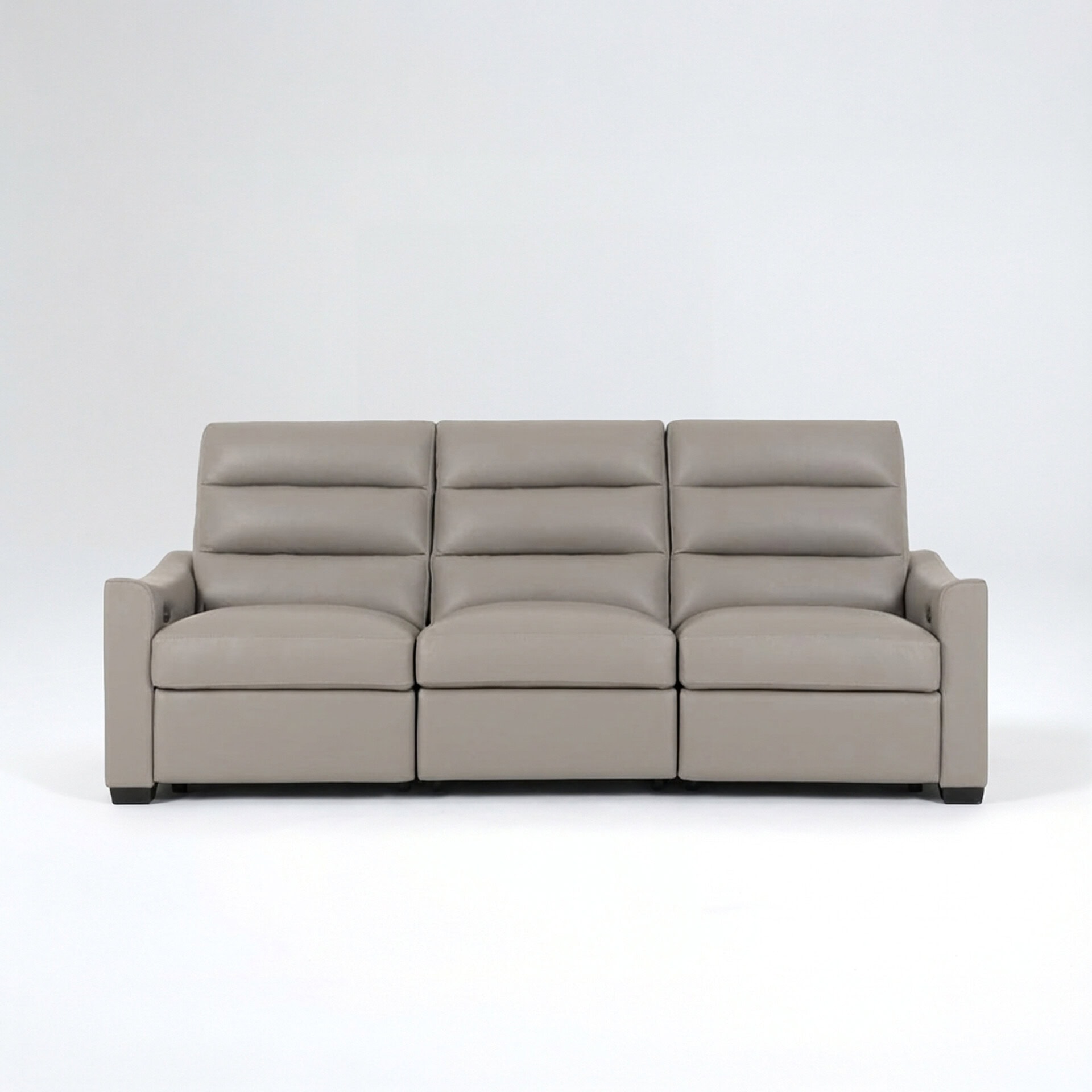 Elegant gray leather sofa with plush cushions and armrests for stylish comfort.