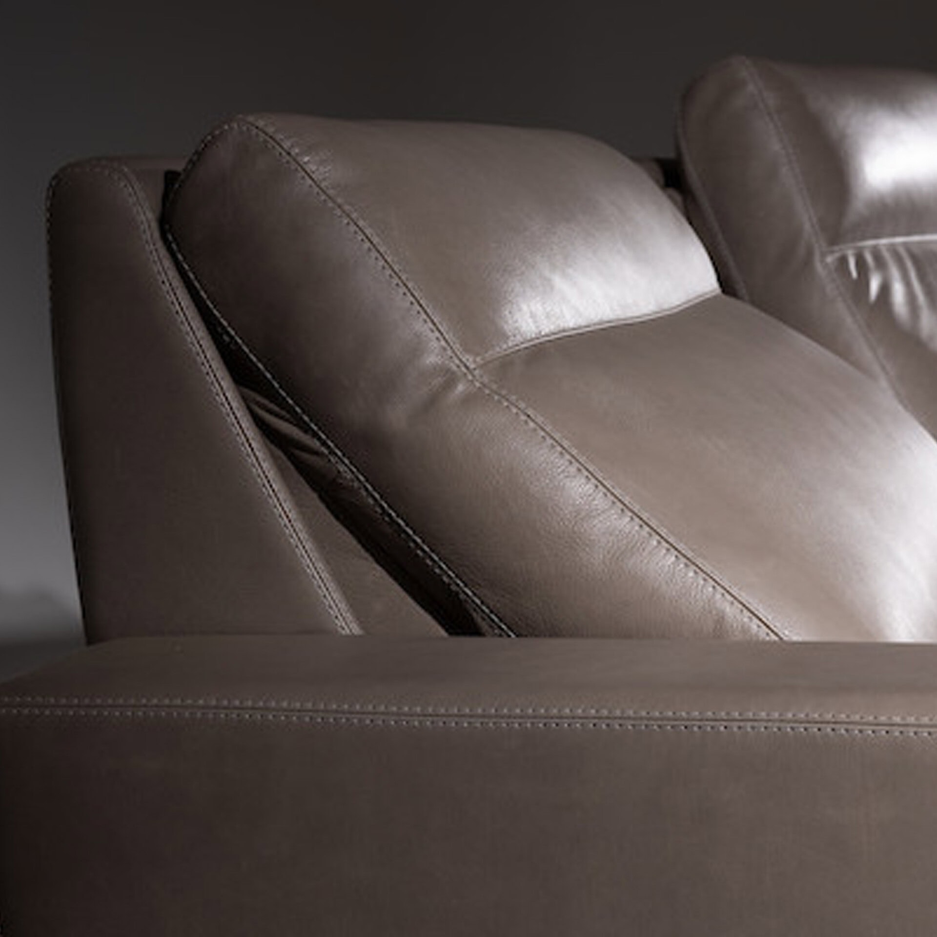 Elegant brown leather sofa ideal for contemporary living room decor.