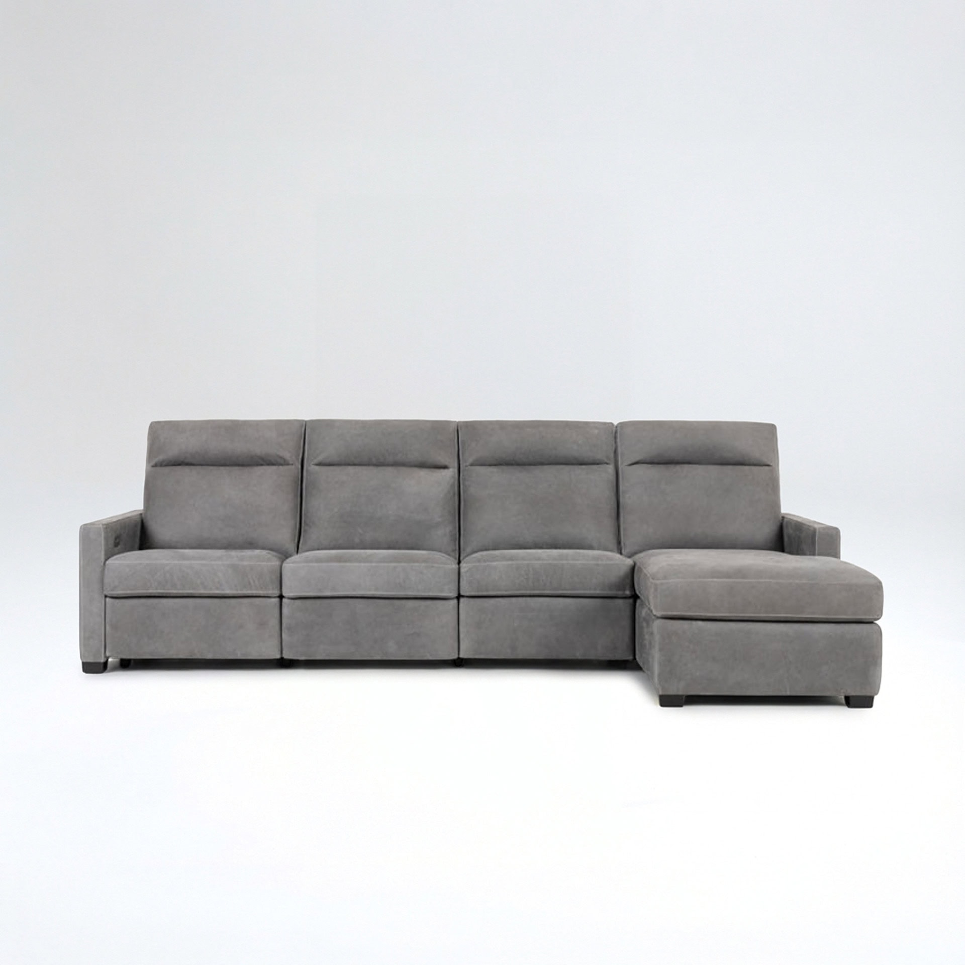 Contemporary gray sectional sofa with chaise lounge for stylish living rooms.