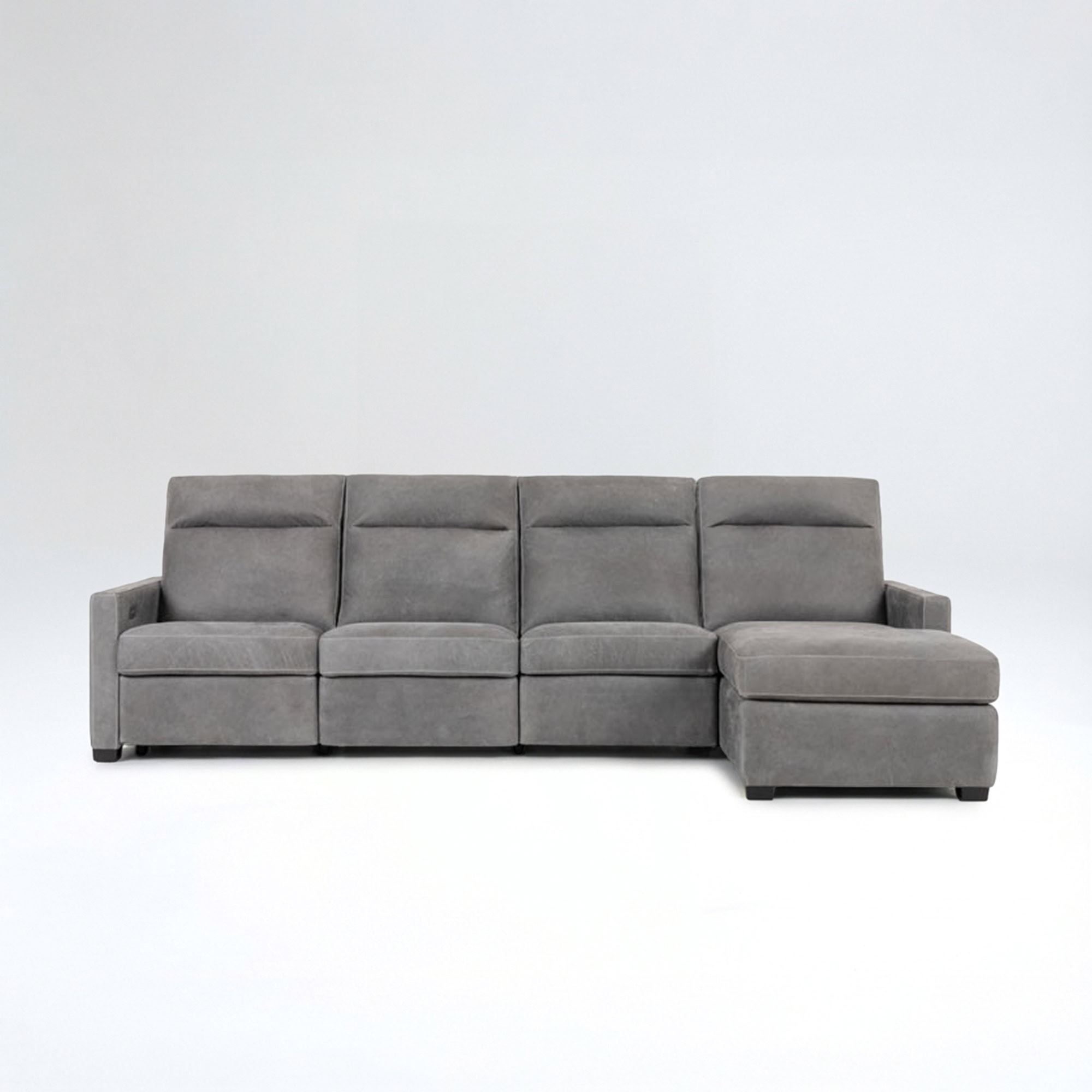 Contemporary gray sectional sofa with chaise lounge for stylish living rooms.